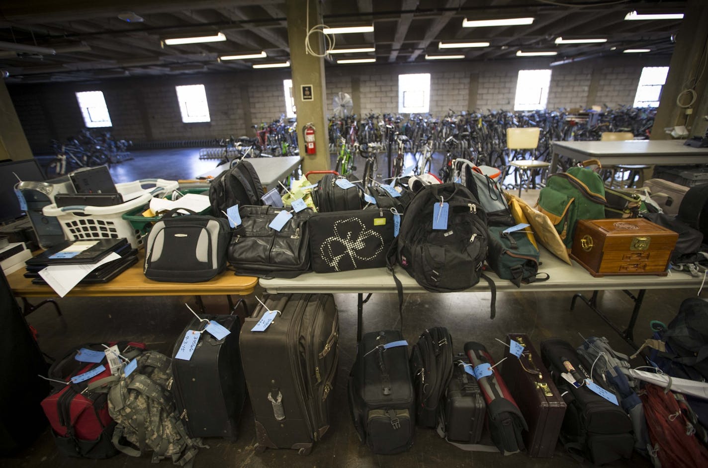 Part of three long tables full of stolen items recovered by Sgt. Richard Jackson from a robbery suspect's home recently. Photographed on Monday, September 14, 2015 in Minneapolis, Minn.