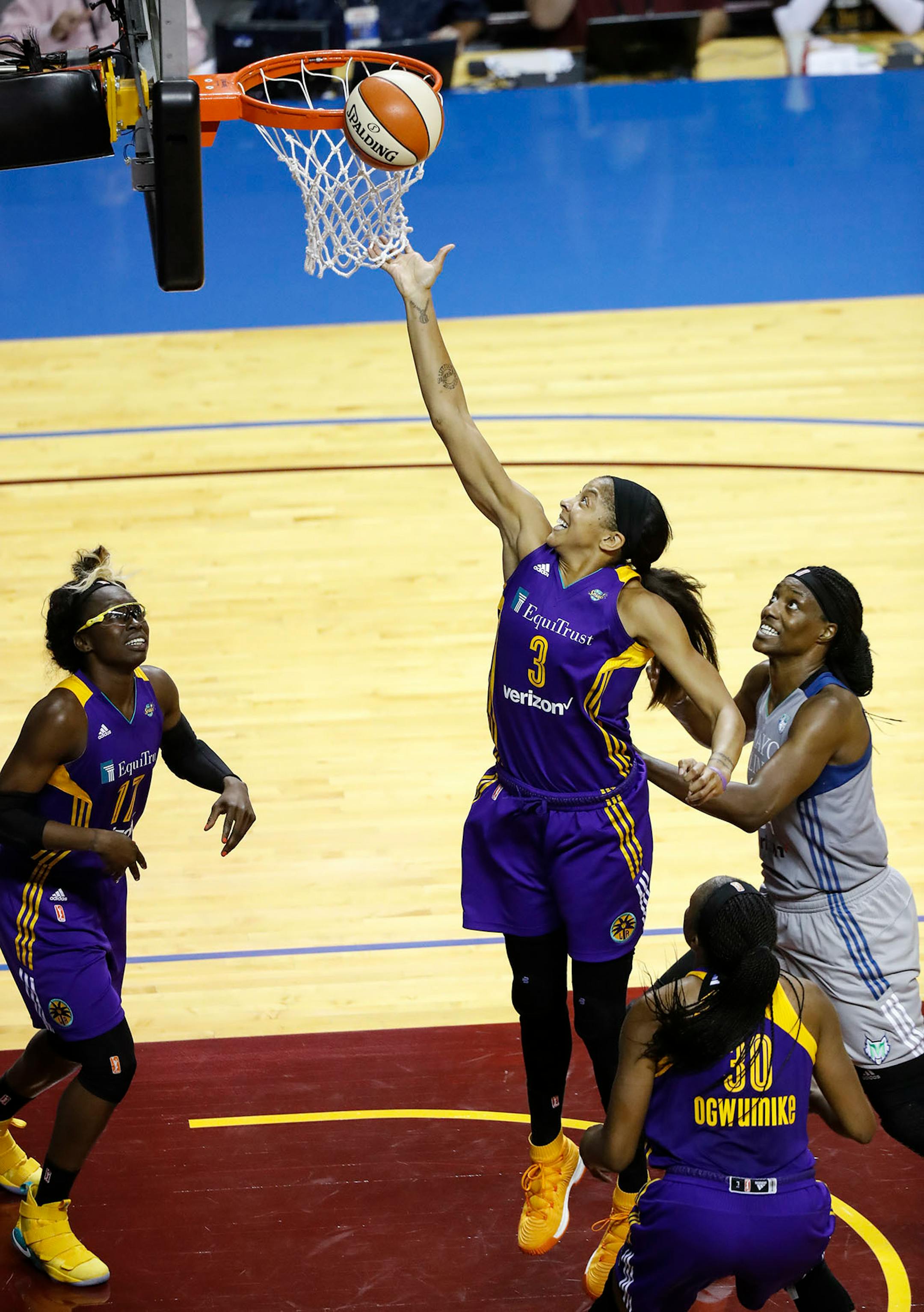 Los Angeles Sparks forward Candace Parker (3) was excited to grab a lynx missed basket in the last moments of the second half. The Sparks won 85-84.