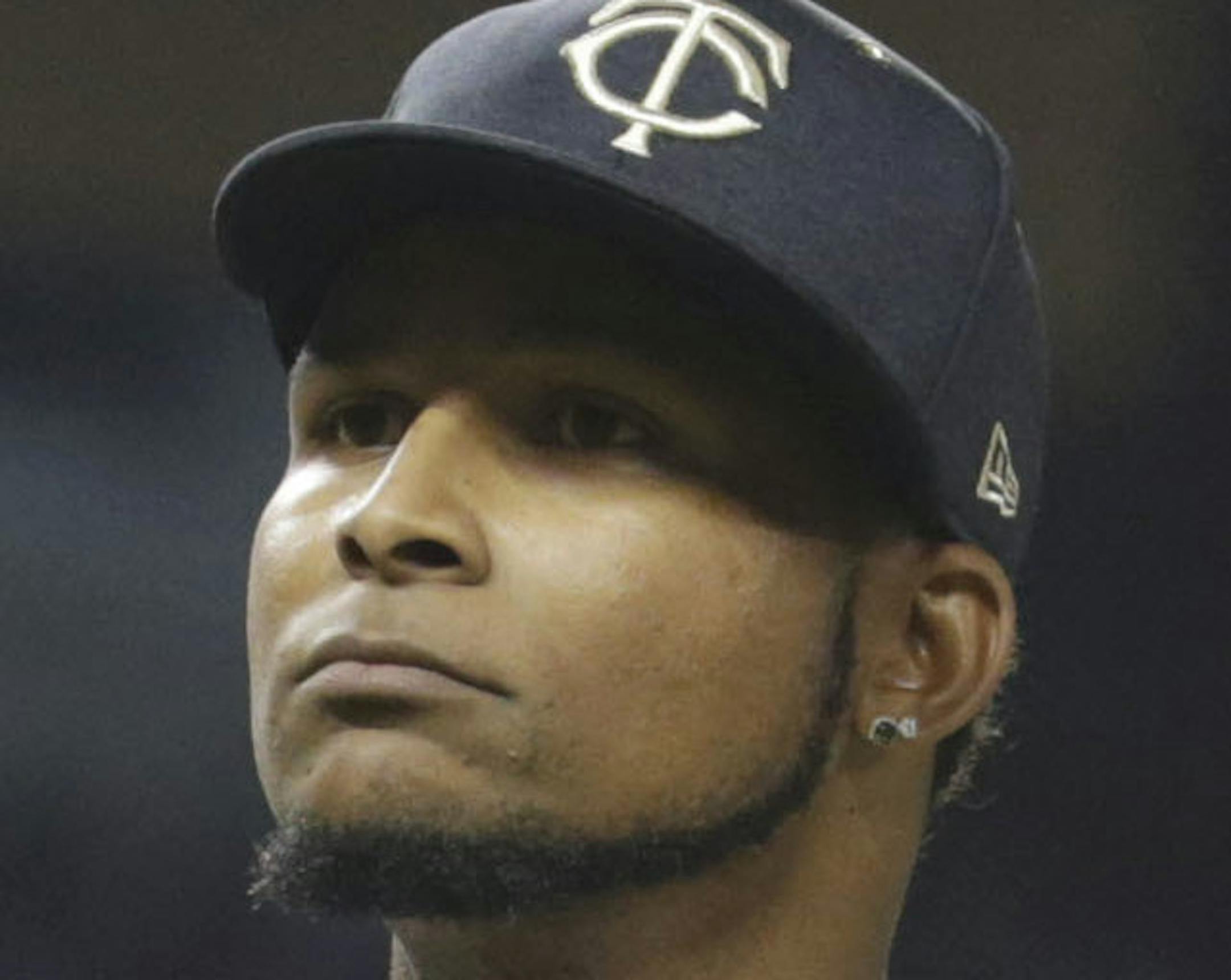 CORRECTS ID OF THE PITCHER TO MINNESOTA TWINS PITCHER ERVIN SANTANA - American League's Minnesota Twins pitcher Ervin Santana (54) reacts after giving up a home run to St. Louis Cardinals catcher Yadier Molina in the sixth inning during the MLB baseball All-Star Game, Tuesday, July 11, 2017, in Miami. (AP Photo/Lynne Sladky)