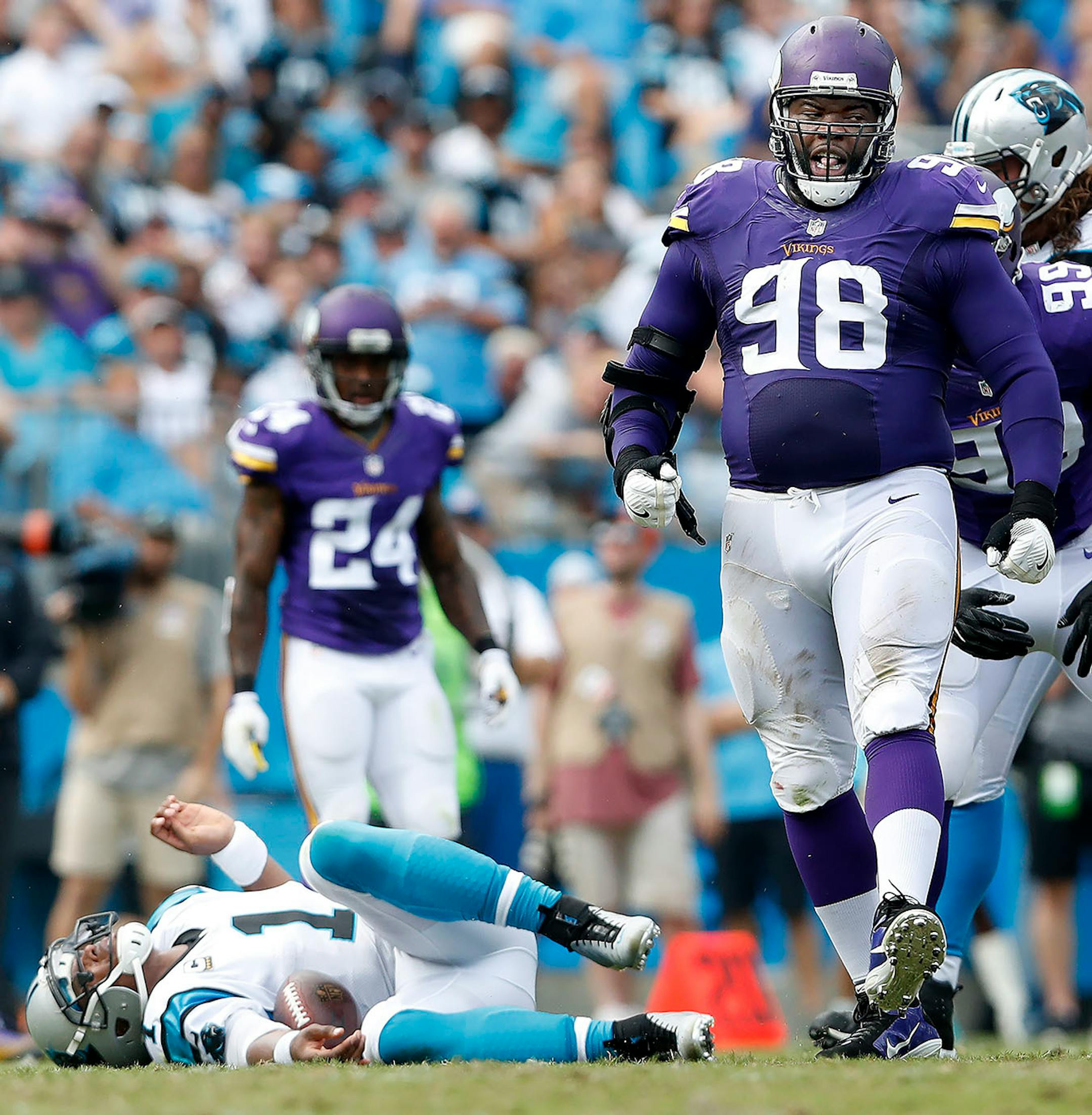 Linval Joseph (98) celebrated after sacking Cam Newton (1) in the second quarter.