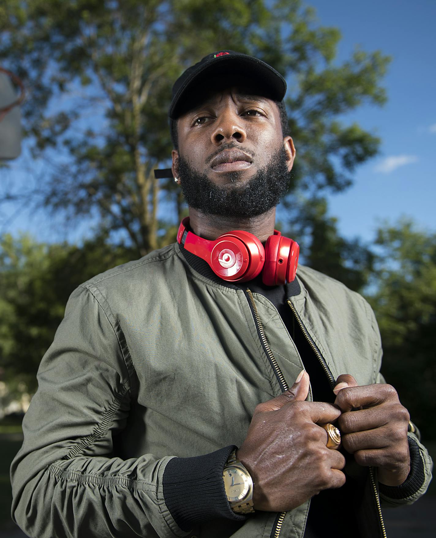 Lawrence McKenzie, a rapper known as Mac Irv, stood for a portrait at a community basketball court close to his home in Robbinsdale on Monday. McKenzie was previously a point guard for the University of Minnesota's basketball team, and has been transitioning his life towards rap. "It was difficult as far as socially, but it was the same in terms of work ethic," said McKenzie, of the transition from hoops to hip-hop. ] Isaac Hale &#xef; isaac.hale@startribune.com Lawrence McKenzie, a rapper known