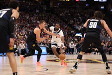 Naz Reid drives toward the basket Monday night as the Timberwolves continued their drive toward the NBA title.