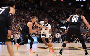 Naz Reid drives toward the basket Monday night as the Timberwolves continued their drive toward the NBA title.