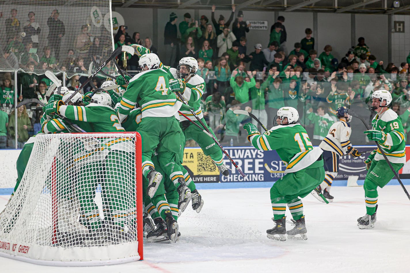 Edina players celebrate after the Hornets beat Wayzata 2-1 in the Class 2A Section 6 boys hockey championship March 1, 2023, at Bloomington Ice Garden. Edina vs. Wayzata, boys hockey Section 6AA championship, 3-1-23. Photo by Mark Hvidsten, SportsEngine