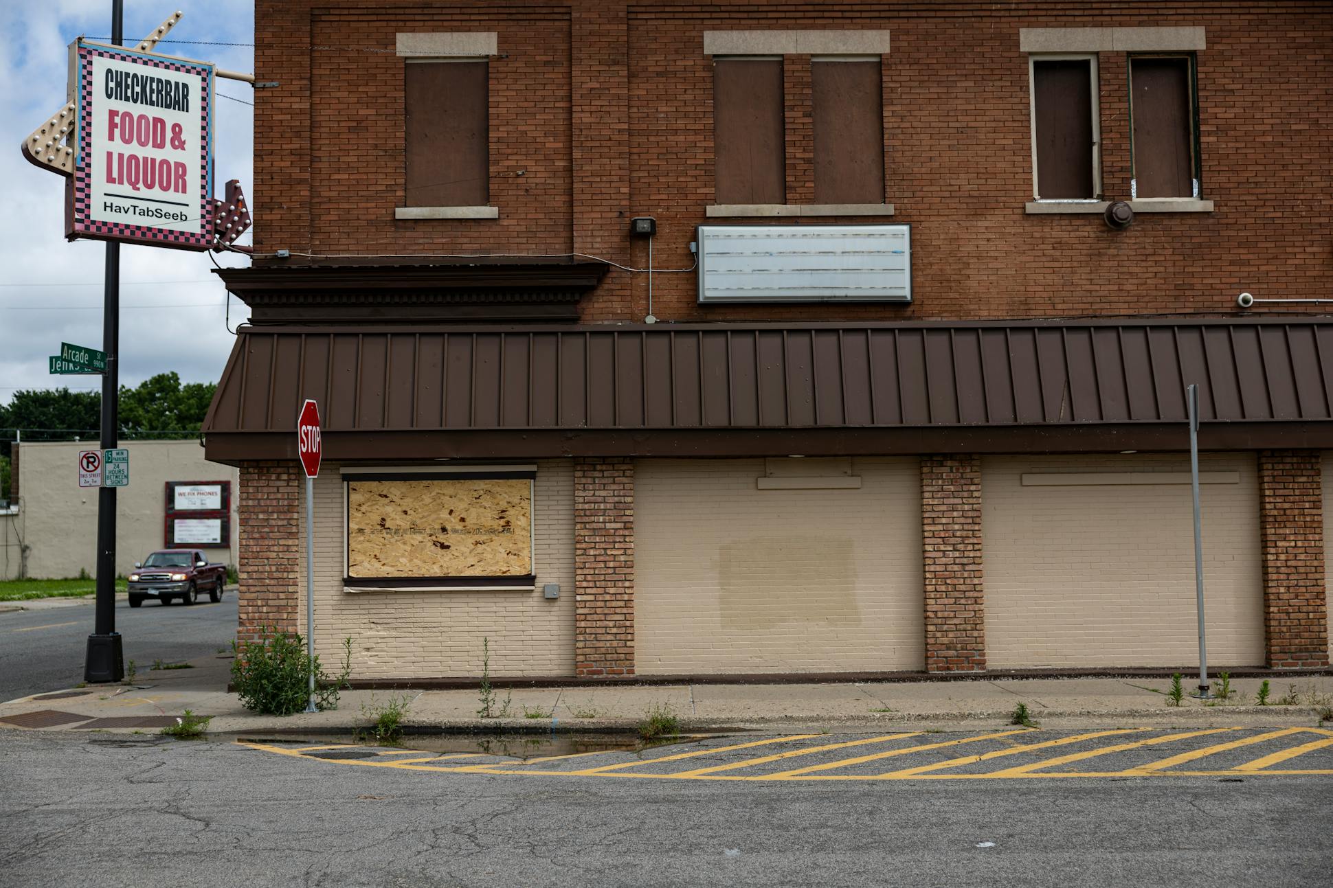 A boarded up building is seen on Arcade Street in St. Paul on Sunday, June 23.