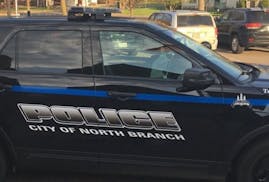 A woman was fatally shot by a North Branch police officer about 9:20 p.m. Thursday.