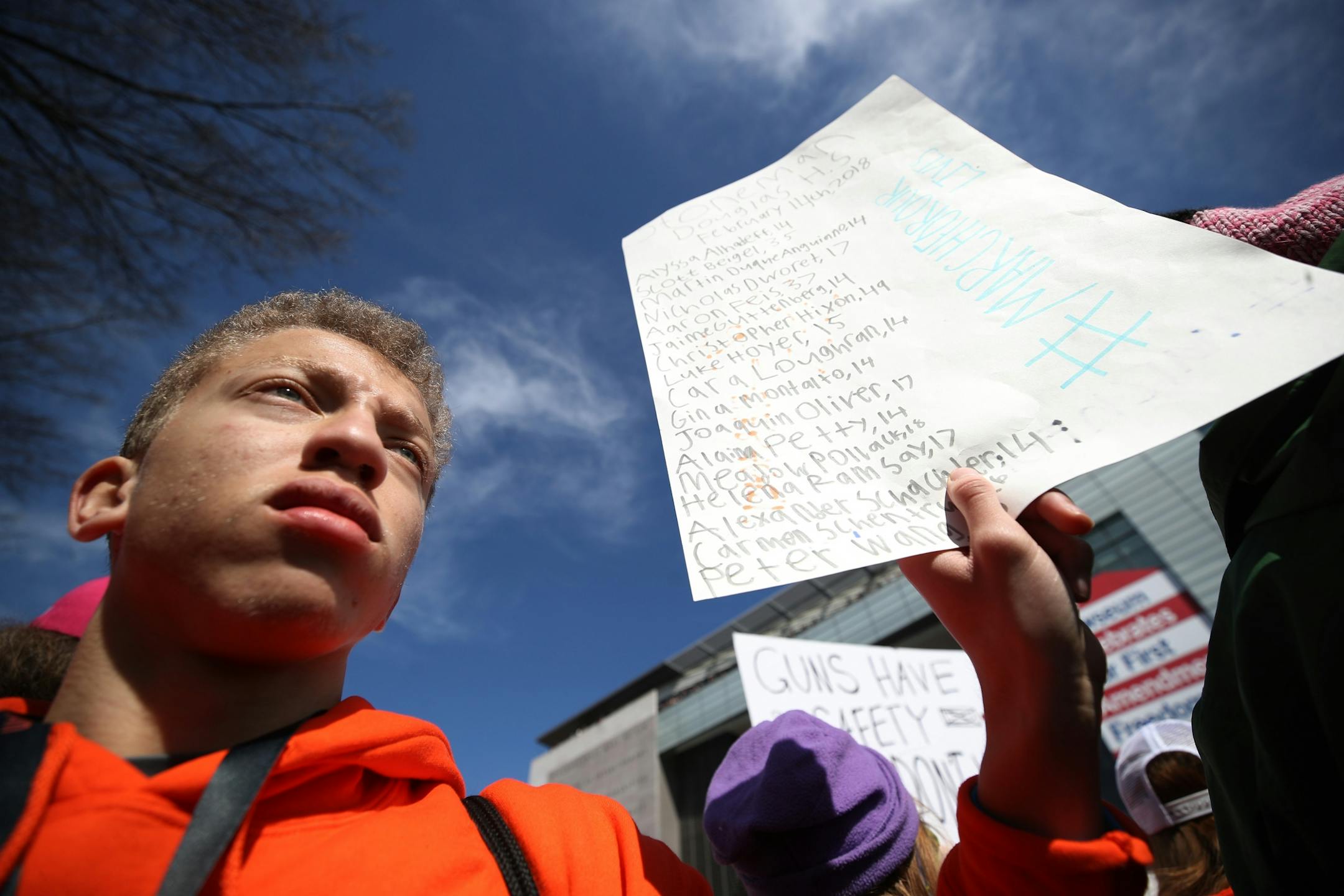Derek Dean, 15, of Sibley High School held a list of the shooting victims from Marjory Stoneman Douglas High as he joined other Minnesota students at the March for Our Lives rally Saturday, March 24, 2018, in Washington, D.C.