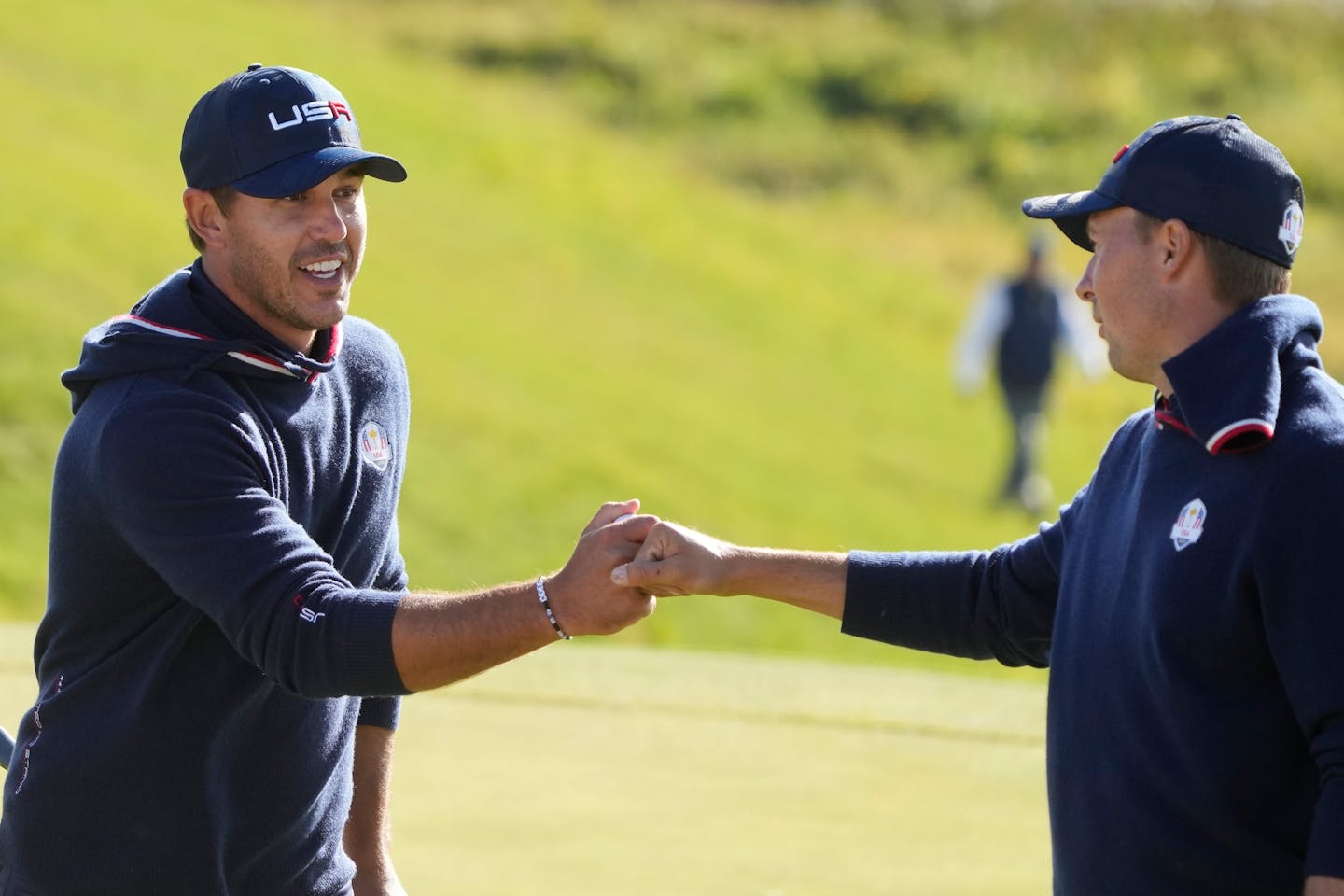 Team USA's Brooks Koepka reacts after making a putt on the 10th hole during a four-ball match Saturday at the Ryder Cup.