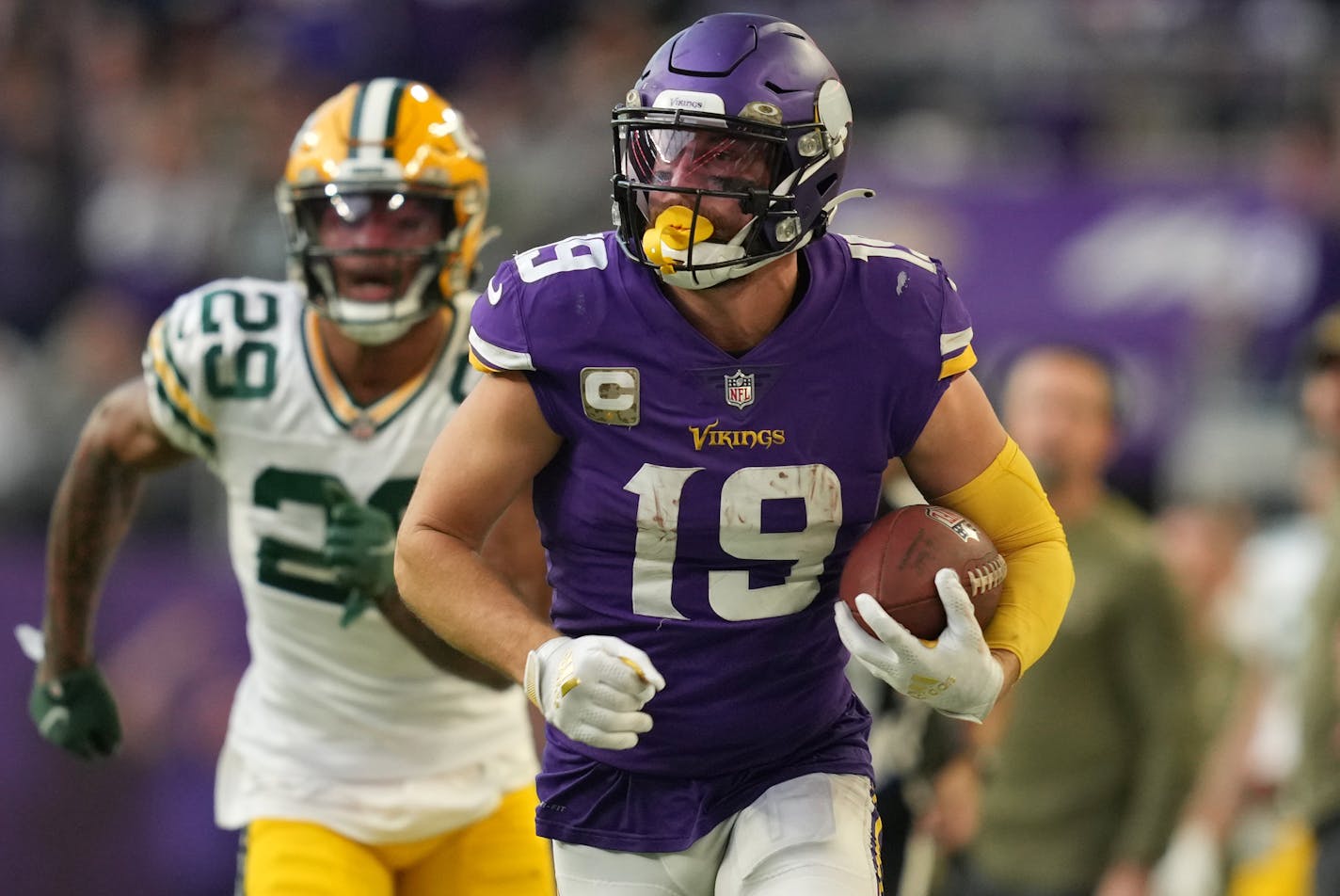 Minnesota Vikings wide receiver Adam Thielen (19) sprinted towards the end zone after he caught a pass from quarterback Kirk Cousins (8) late in the fourth quarter of an NFL game between the Minnesota Vikings and the Green Bay Packers Sunday, Nov. 21, 2021 at U.S. Bank Stadium in Minneapolis. ] ANTHONY SOUFFLE • anthony.souffle@startribune.com