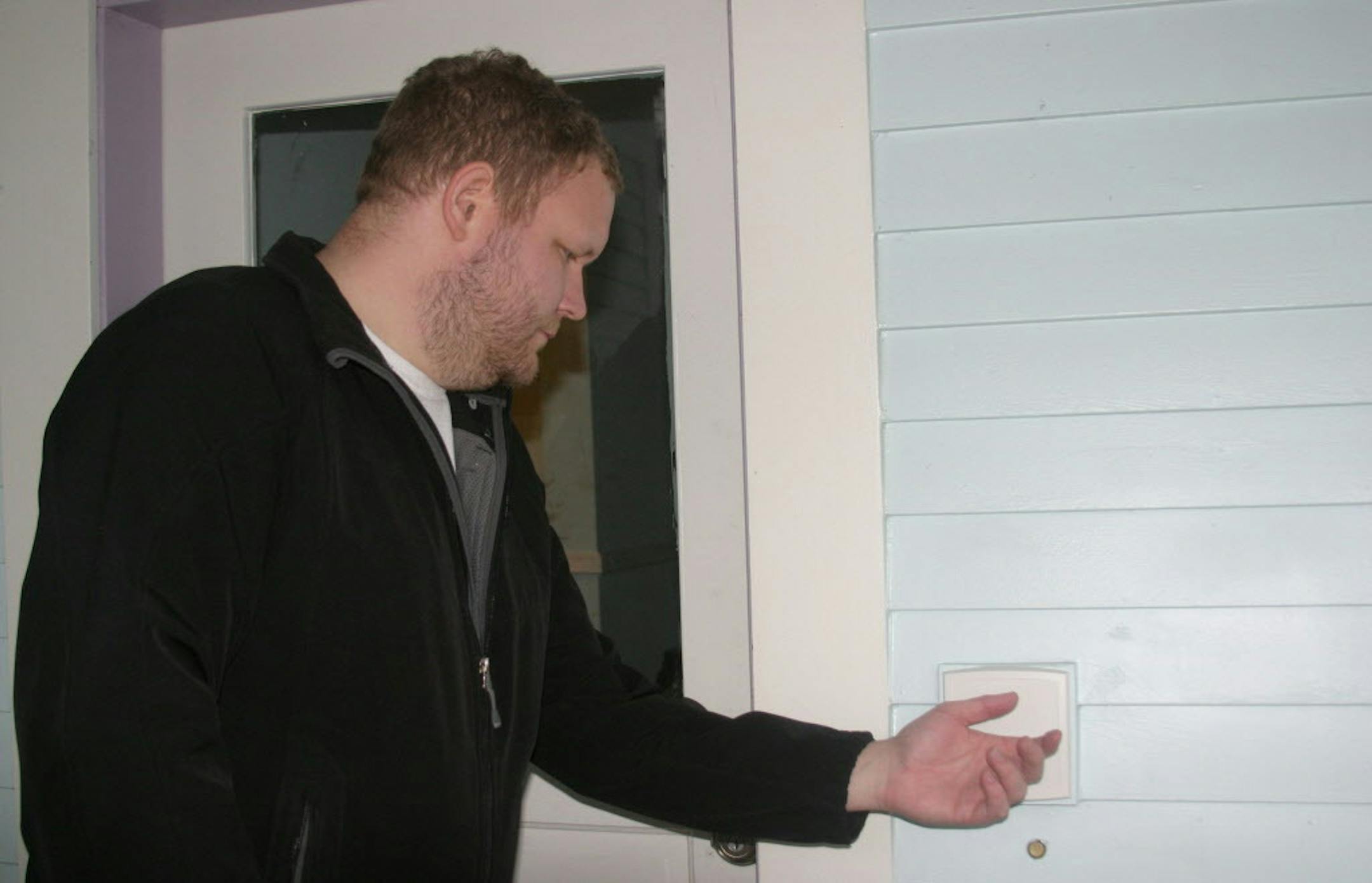 Implantable technology proponent Amal Graafstra of Seattle demonstrates how one of the doors to his home can be unlocked just by passing either of his hands past a sensor which reads the signal from a RFID chip implanted in each of his hands. The RFID chips -- each just slightly larger than the size of a grain of rice -- trigger a servo to open the deadbolt on his door. He uses similar technology to unlock his car doors as well as his cell phone, computer and a data center. (Courtesy of Amal Gra