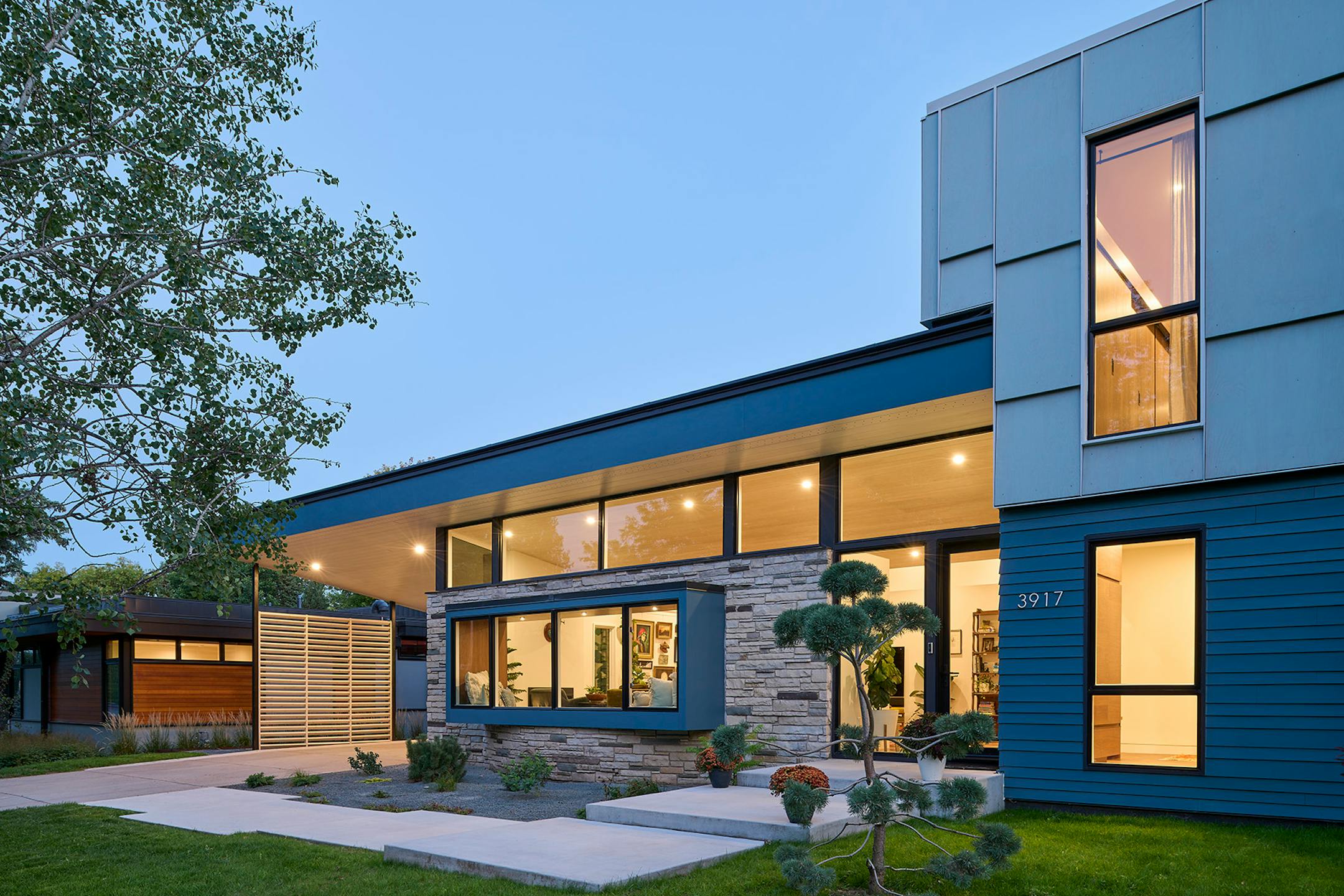 After a fire forced a remodel of a St. Louis Park home, a family hoped for a footprint similar to their original single-story ranch-style house. At the same time, they were game for introducing new, bold and unique materials and design features such as soaring rooflines and transom windows that allow light to come in and display the family's vast plant collection like never before.