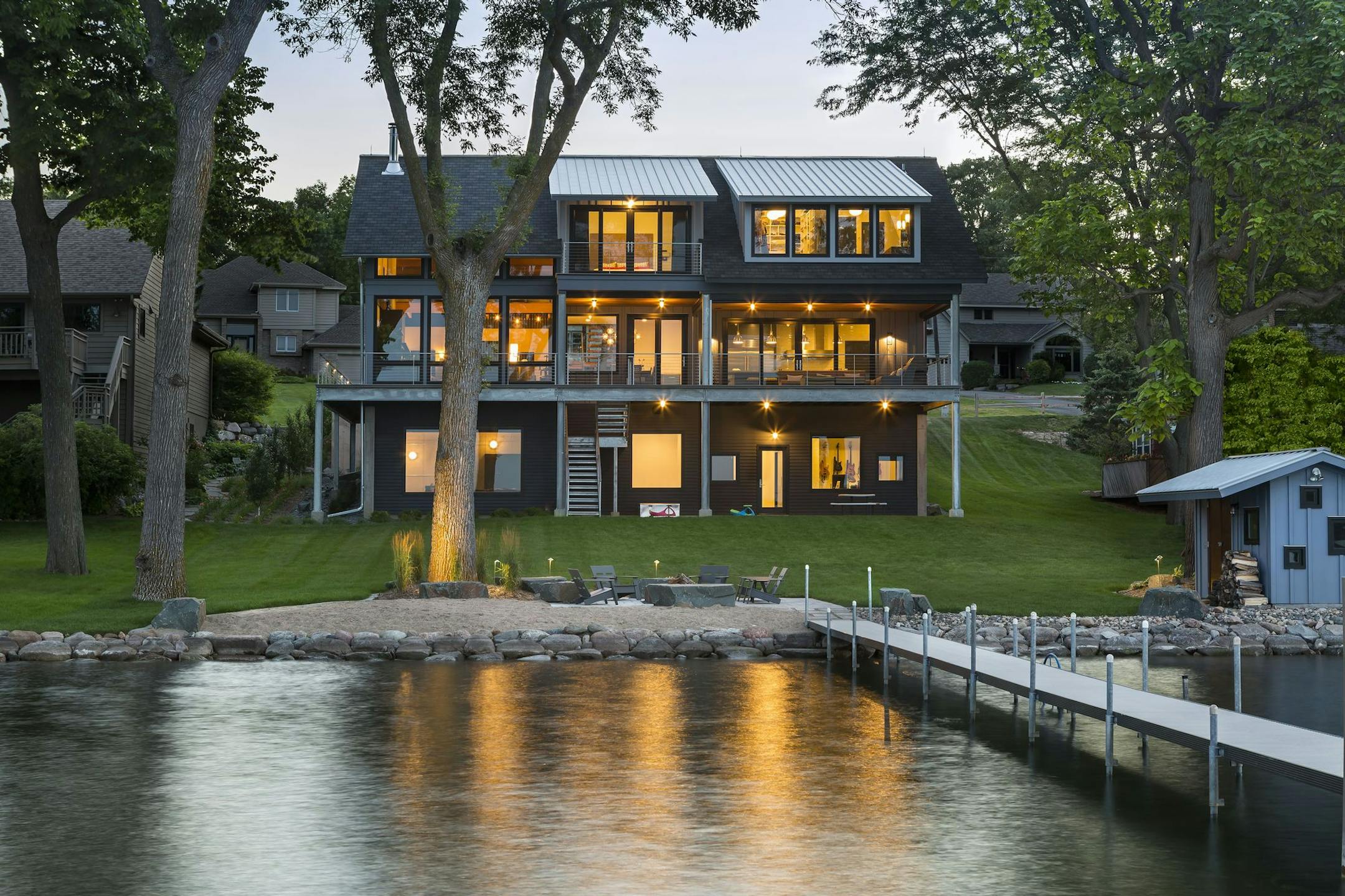 The three-level walkout boasts expanses of glass facing the Lake Minnetonka bay.