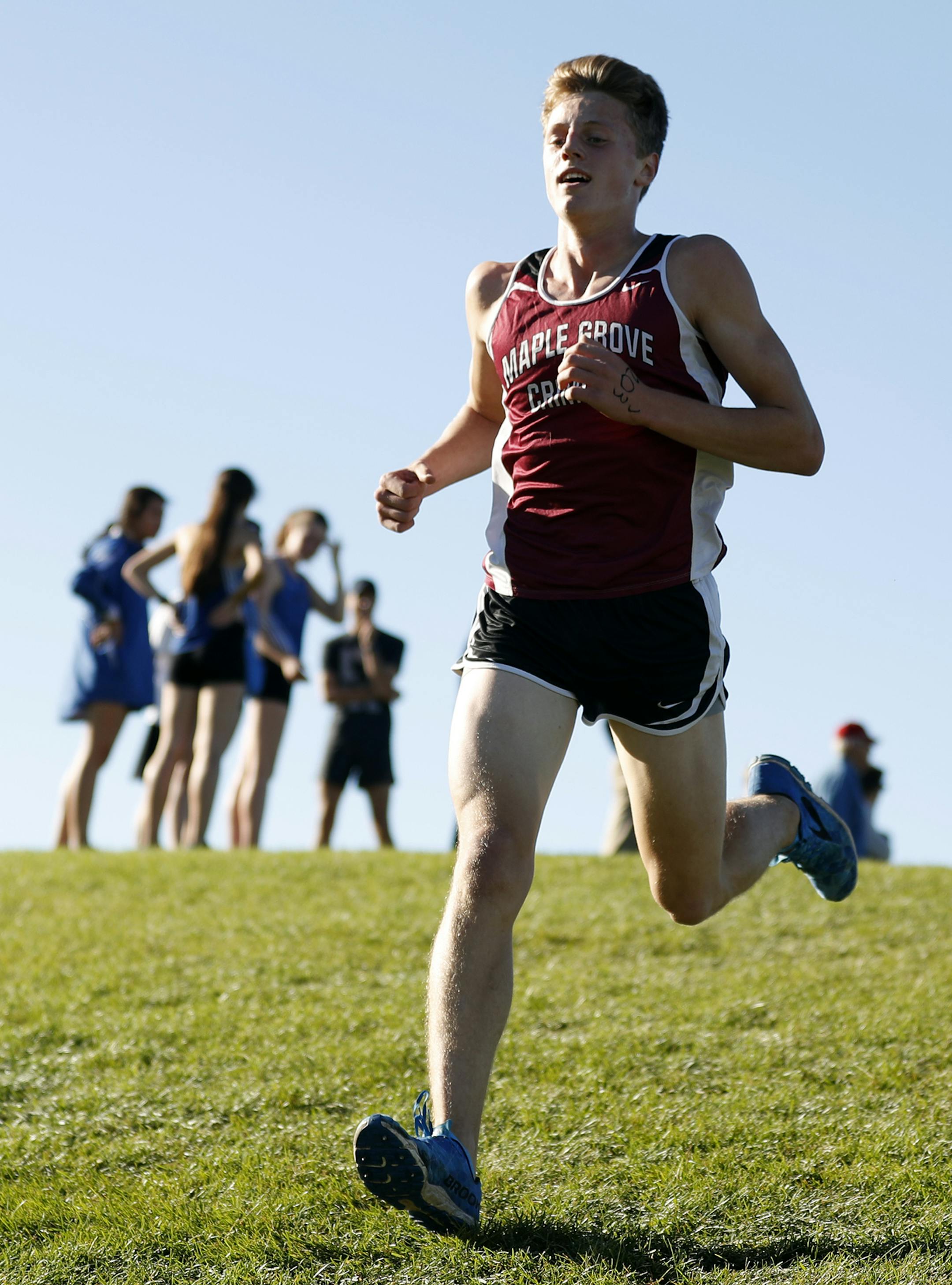 Alex Miley set the pace for junior varsity runners at Maple Grove during a cross-country meet at Central Park Tuesday October 18, 2016 in Brooklyn Park, MN. ] Jerry Holt / jerry. Holt@Startribune.com