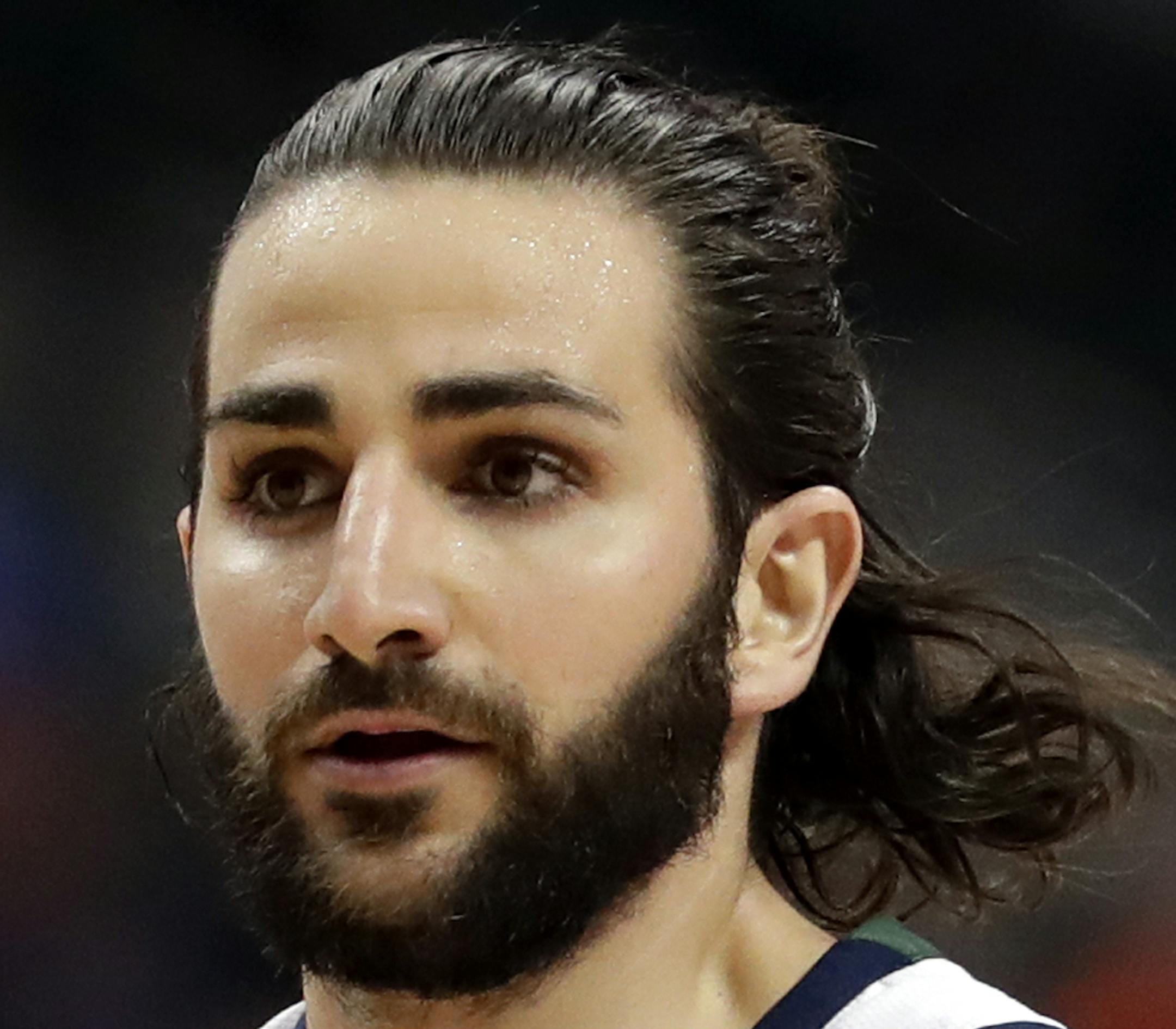 Utah Jazz's Ricky Rubio (3) handles the ball in the second half of an NBA basketball game against the Dallas Mavericks on Thursday, March 22, 2018, in Dallas. (AP Photo/Tony Gutierrez) ORG XMIT: OTKTG103