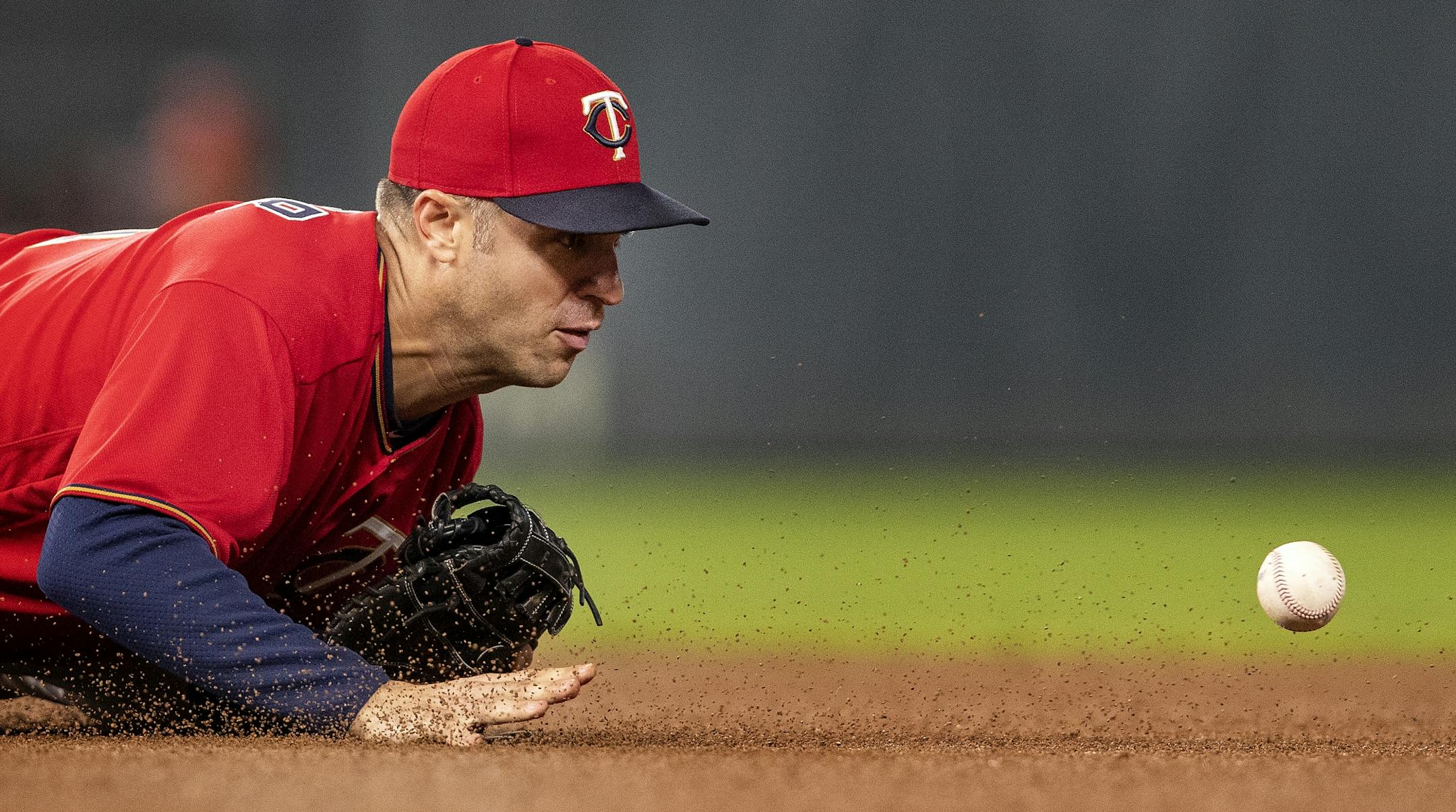 Minnesota Twins first baseman Joe Mauer knocked down a ball hit by George Springer in the seventh inning. Springer was safe on the play.