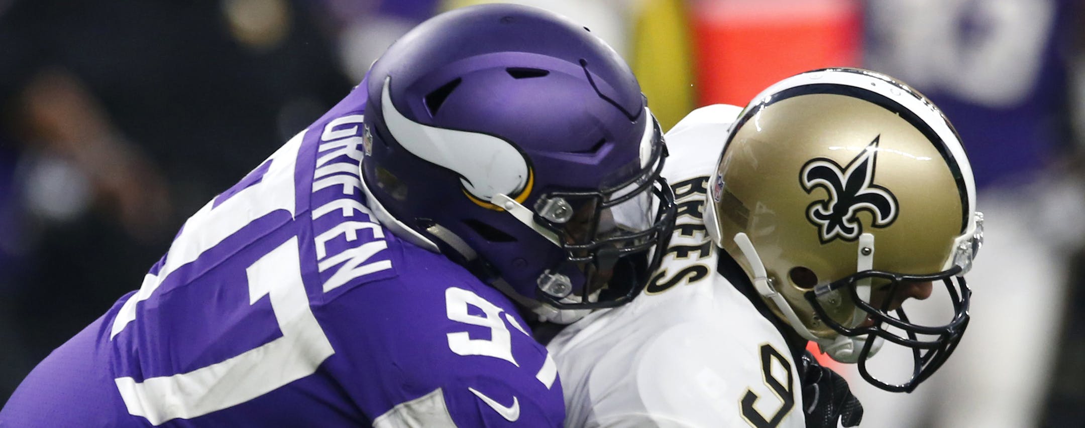 New Orleans Saints quarterback Drew Brees (9) is sacked by Minnesota Vikings defensive end Everson Griffen (97) during the first half of an NFL football game, Monday, Sept. 11, 2017, in Minneapolis. (AP Photo/Jim Mone) ORG XMIT: MNCN118