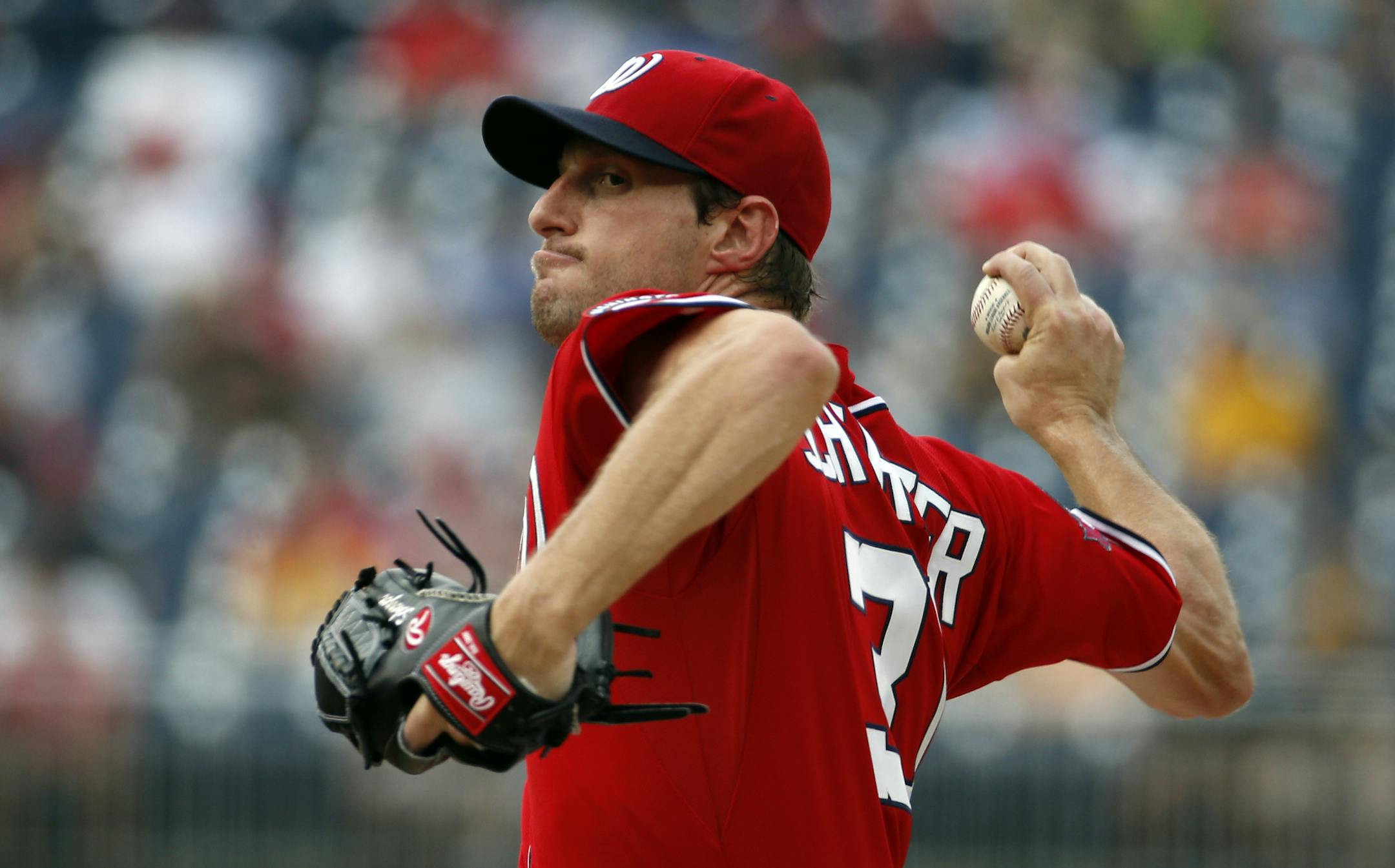 Washington Nationals starting pitcher Max Scherzer throws during the first inning of a baseball game against the Pittsburgh Pirates, Saturday, June 20, 2015, in Washington. (AP Photo/Alex Brandon)