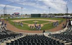 Members of the Minnesota Twins participate in a spring training baseball workout in Fort Myers, Fla., Monday, Feb. 29, 2016.