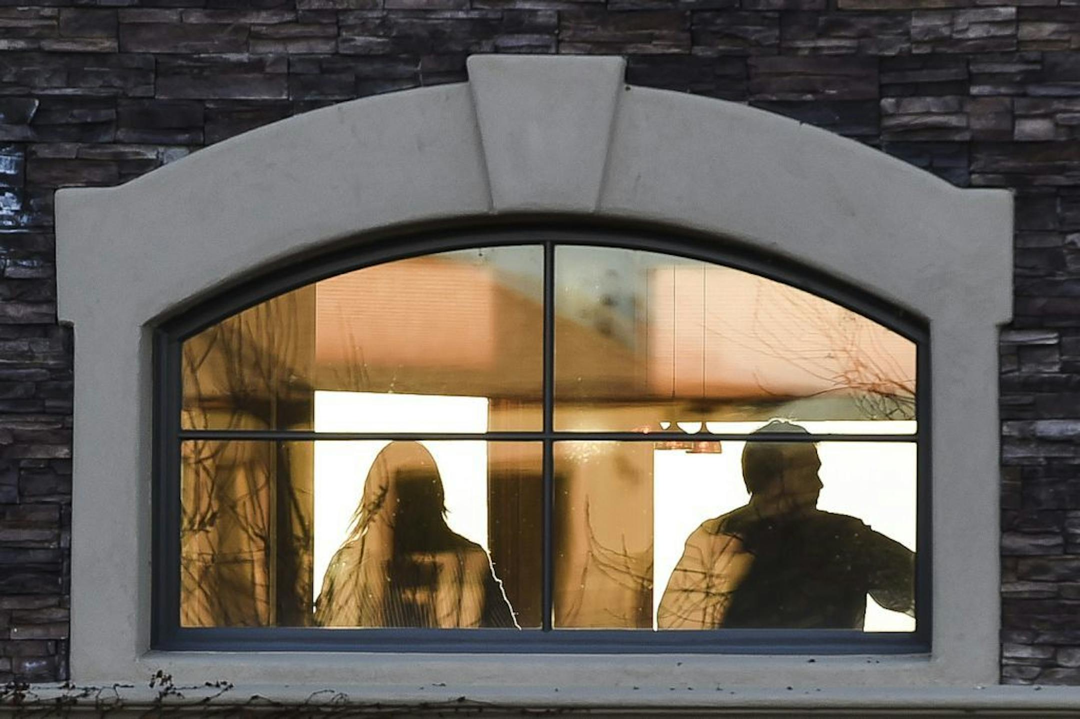 Jim McElwain, right, is being interviewed by Florida's Jeremy Foley for the head football coach vacancy, Tuesday, Dec. 2, 2014, in Fort Collins, CO. Florida athletic director Jeremy Foley spent several hours at McElwain's home Tuesday and was expected to spend the night in Fort Collins, Colorado.