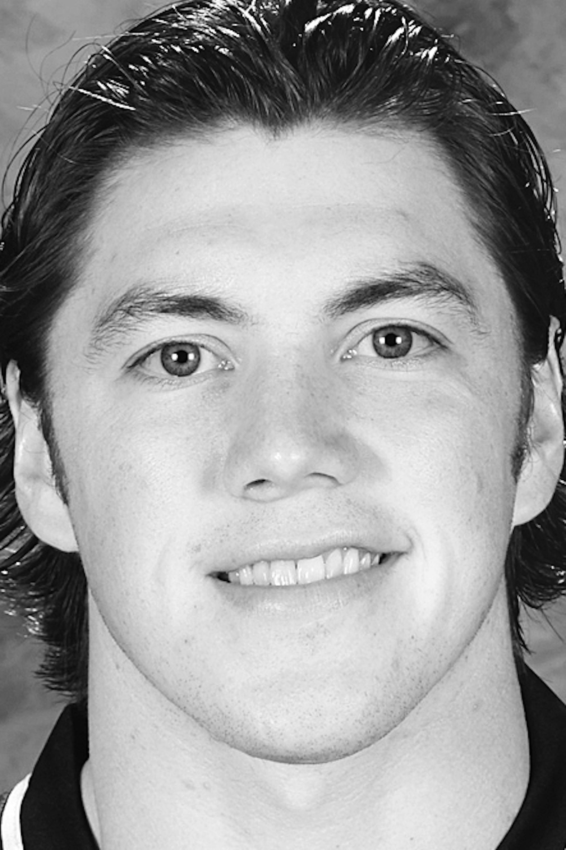 ST. LOUIS, MO ‚Äì SEPTEMBER 12: T.J. Oshie of the St. Louis Blues poses for his official headshot for the 2013-2014 season on September 12, 2013 at the Scottrade Center in St. Louis, Missouri. (Photo by Mark Buckner/NHLI via Getty Images) *** Local Caption *** T.J. Oshie ORG XMIT: 177614449