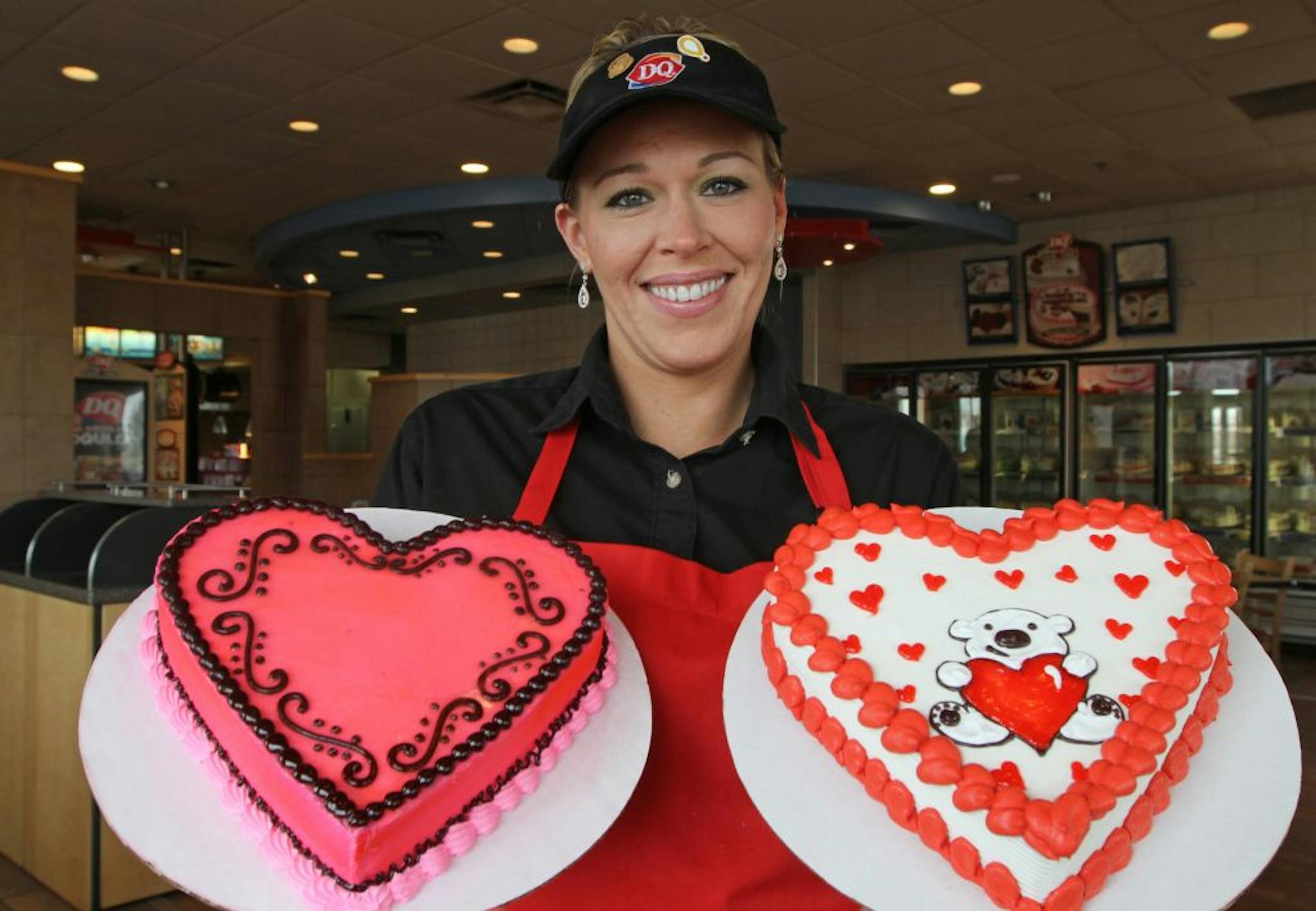 Alicia Jindra made a Valentine's Day cake at the Dairy Queen Chill & Grill in Coon Rapids. Jindra is the newly-crowned queen of Dairy Queen's cake decorators with last months win in the the Dairy Queen's "Iron Tip" cake decorating international competition in San Diego. She beat out 223 other DQ decorators who submitted more than 1,500 photos of their most creative work.