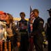 Ashley Mehrwerth gave friend and fellow driver T.J. Inderieden a smooch on the cheek after the trophy presentation on victory lane following his win i