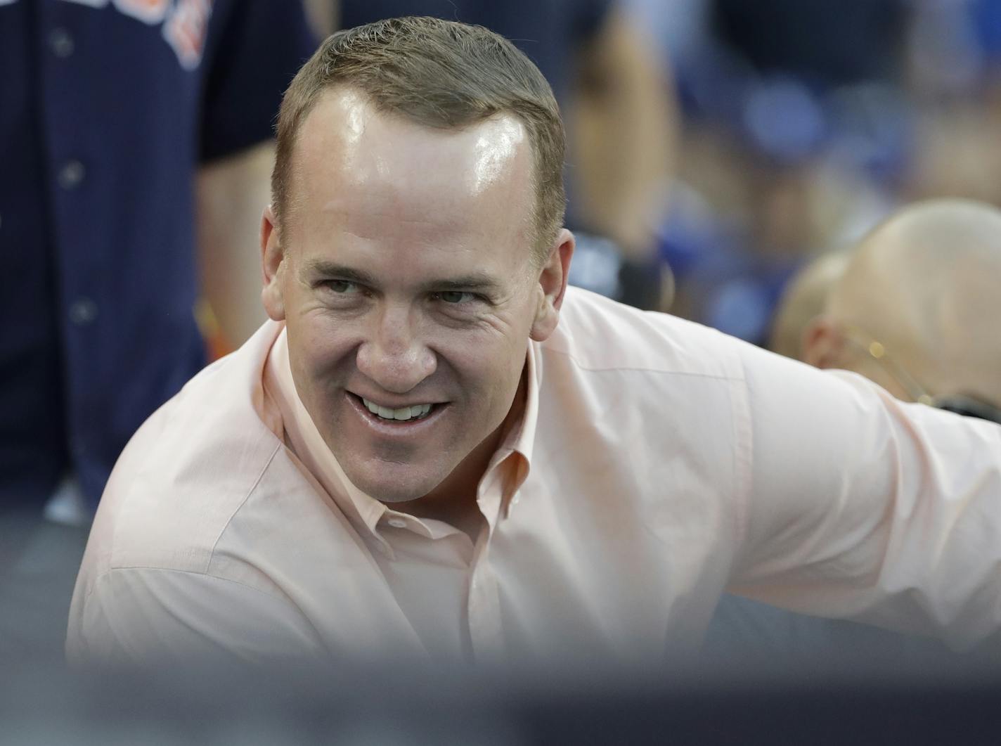 Peyton Manning is seen during the first inning of Game 2 of baseball's World Series between the Houston Astros and the Los Angeles Dodgers Wednesday, Oct. 25, 2017, in Los Angeles. (AP Photo/David J. Phillip)