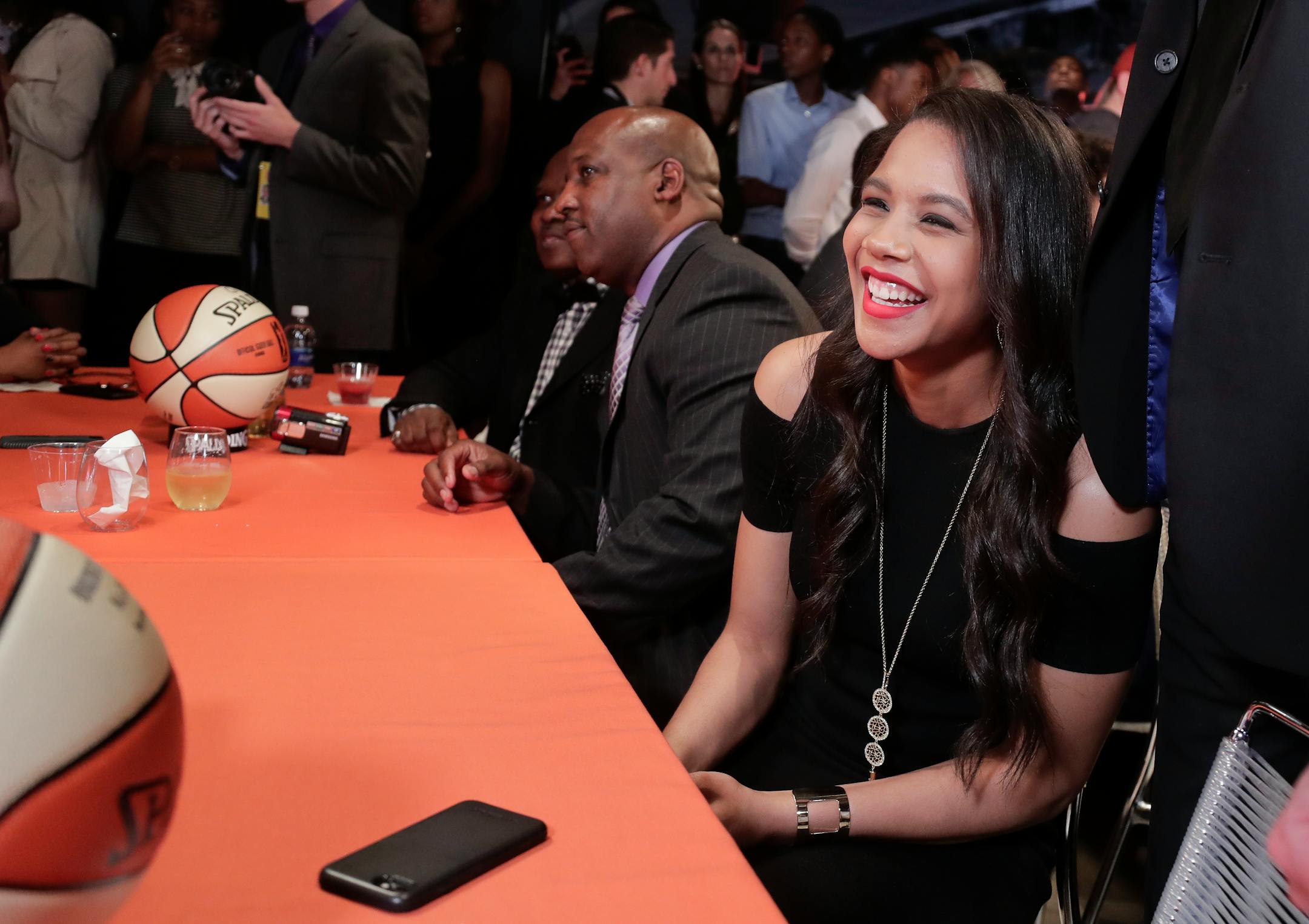 Nia Coffey reacts after being selected as the fifth overall pick in the WNBA basketball draft by the San Antonio Stars, Thursday, April 13, 2017, in New York. (AP Photo/Julie Jacobson)