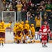 The University of Minnesota women’s hockey team celebrates after defeating Wisconsin 4-3 and claiming the series sweep Saturday, Jan. 22, 2022 in Ri