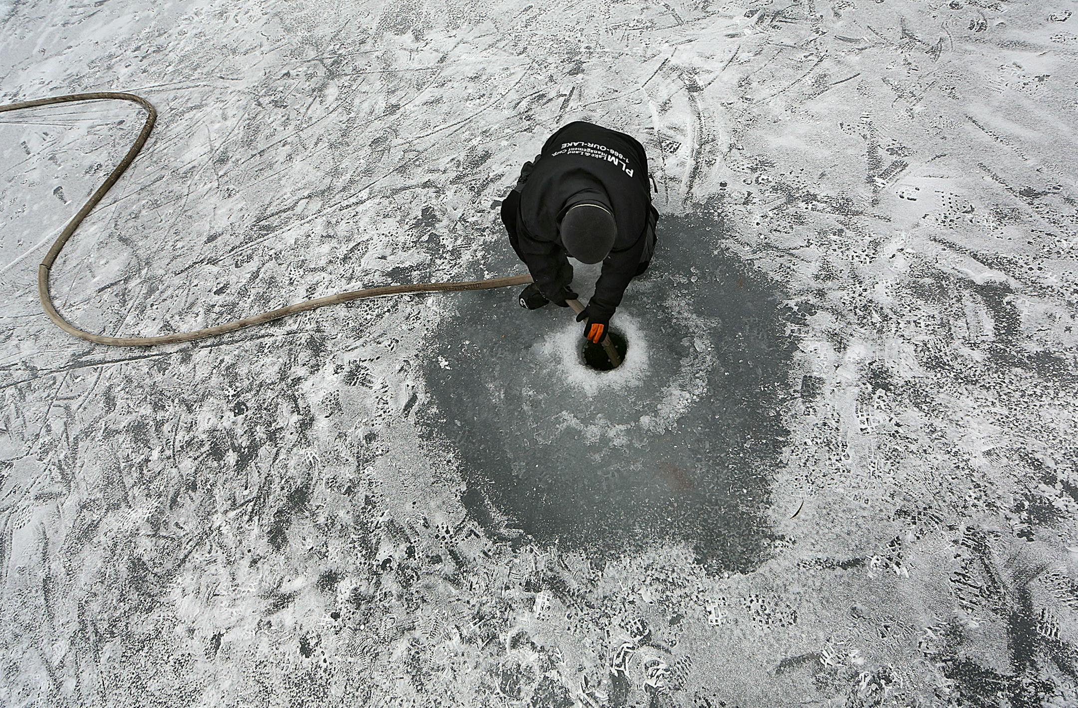Aquatic applicator Travis Aune injected a solution containing potash through the ice and into Christmas Lake.] JIM GEHRZ ‚Ä¢ james.gehrz@startribune.com / Shorewood, MN / December 19, 2014 /11:00 AM BACKGROUND INFORMATION: The Minnesota DNR and a contractor injected potassium chloride (potash) under the ice of on Christmas Lake in Shorewood, the third place in the country and first in Minnesota to try to use potash to kill off zebra mussels. The contractor is Invasive Plant Mana