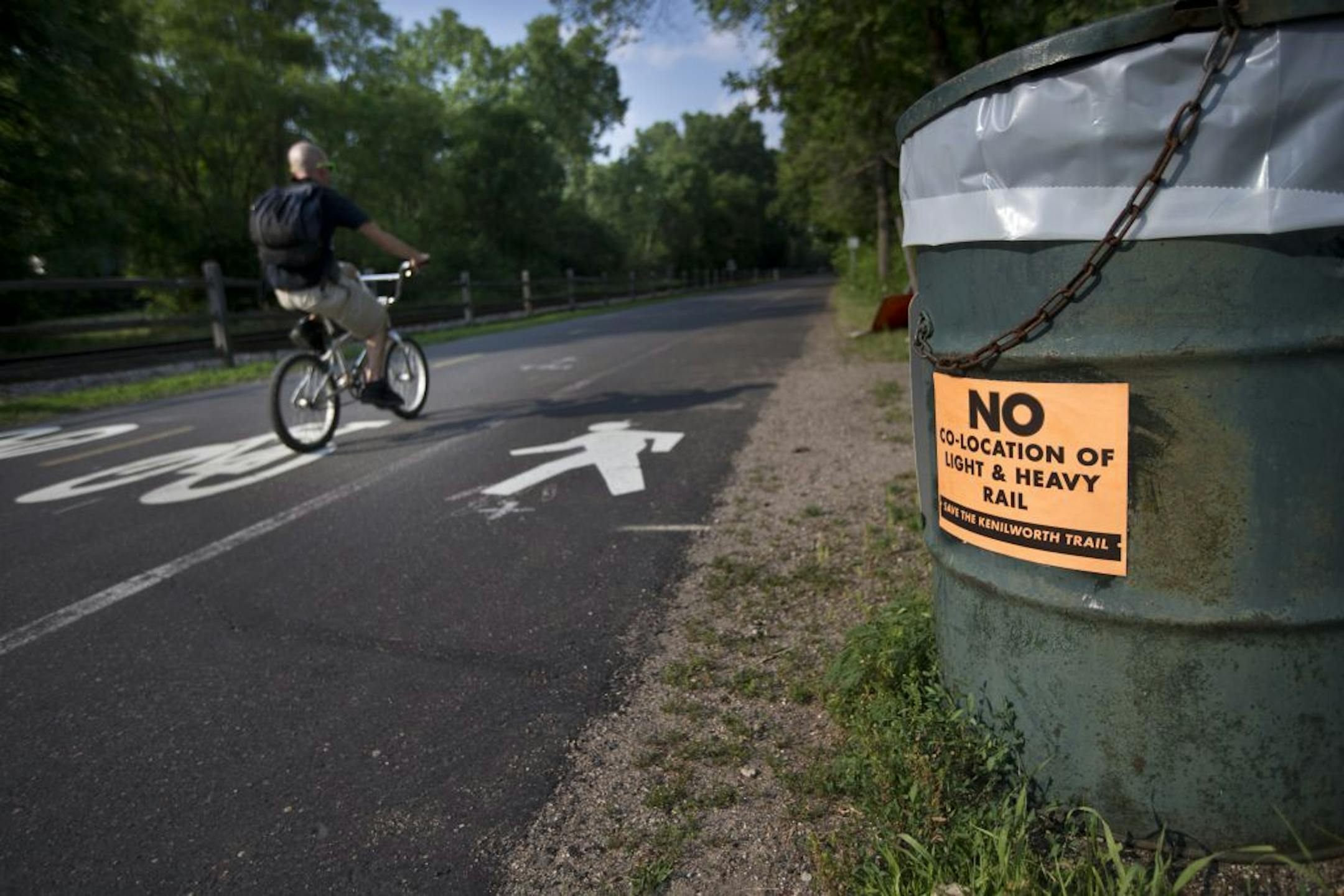 The Kenilworth Trail alongside a freight train track that is adjacent to a proposed site for the Southwest Corridor light rail line.