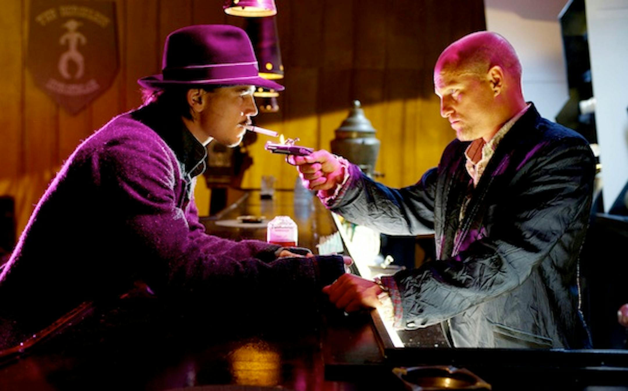 Josh Hartnett in an old-man hipster hat and Woody Harrelson with a joke shop cigarette lighter, in "Bunraku." Photo: ARC Entertainment.