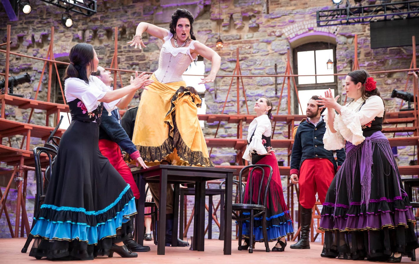 Audrey Babcock as Carmen (on table) in "Carmen" by Mill City Summer Opera.
credit: Dan Norman