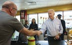 Democratic presidential candidate and former Vice President Joe Biden greets people at Gianni's Pizza, in Wilmington Del., Thursday, April 25, 2019. J