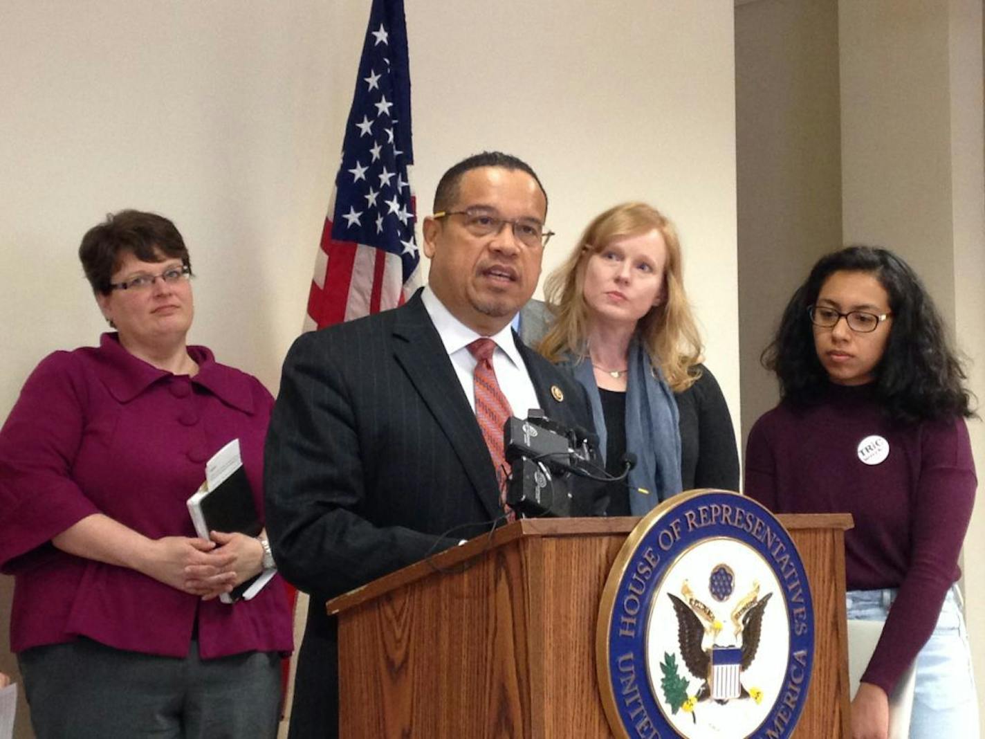 Rep. Keith Ellison speaks to reporters Monday, March 20, 2017 at the Minneapolis Urban League. Behind Ellision are, from left to right, Deanna White of Clean Water Action, St. Louis Park cancer survivor Karen Laumb and MCTC student Erika Hernandez. EMMA NELSON Star Tribune