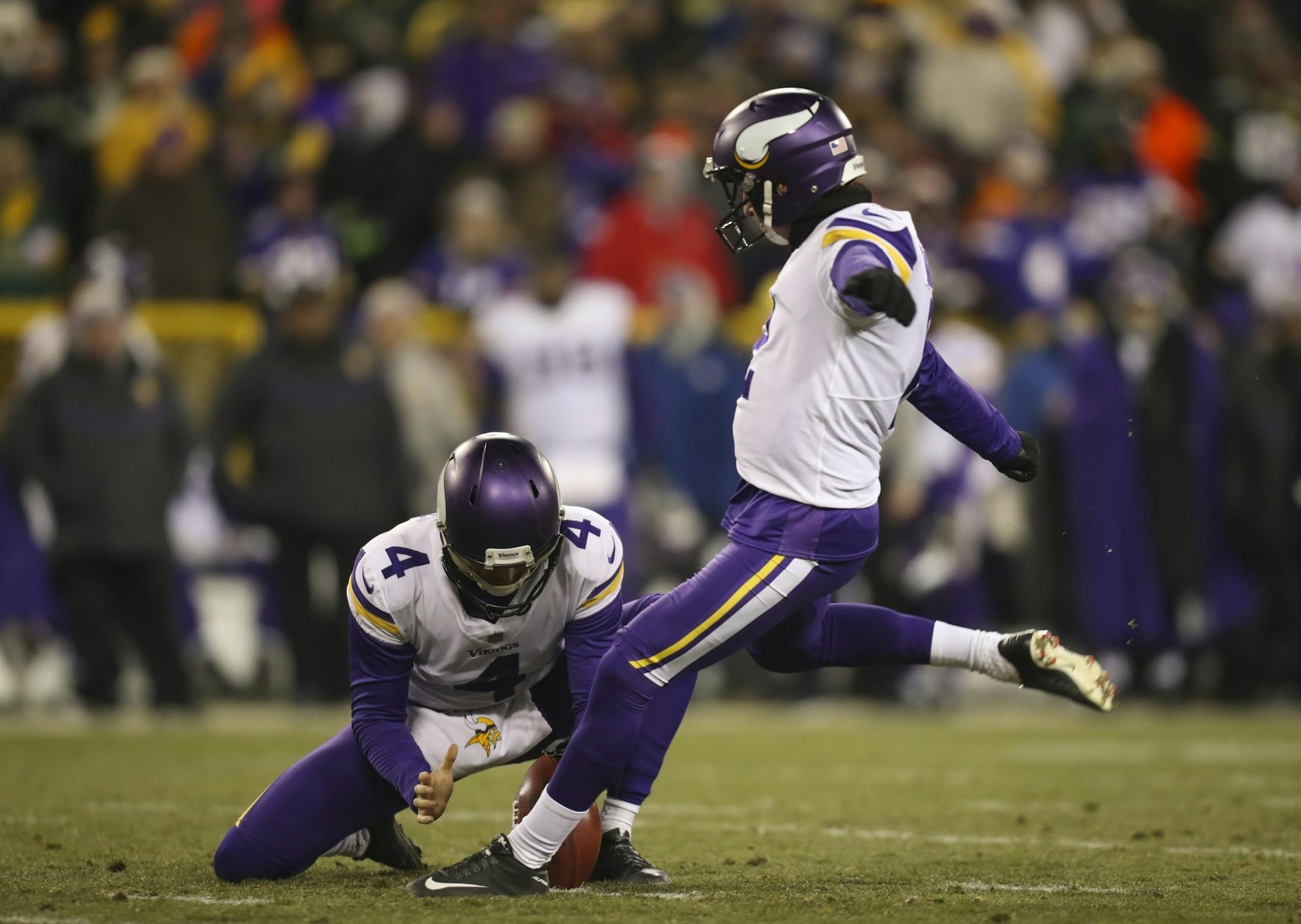 Kai Forbath and holder Ryan Quigley