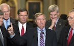 Sen. Lindsey Graham, R-S.C., joined by, from left, Sen. Roy Blunt, R-Mo., Majority Whip John Cornyn, R-Texas, Sen. John Barrasso, R-Wyo., Sen. Bill Ca