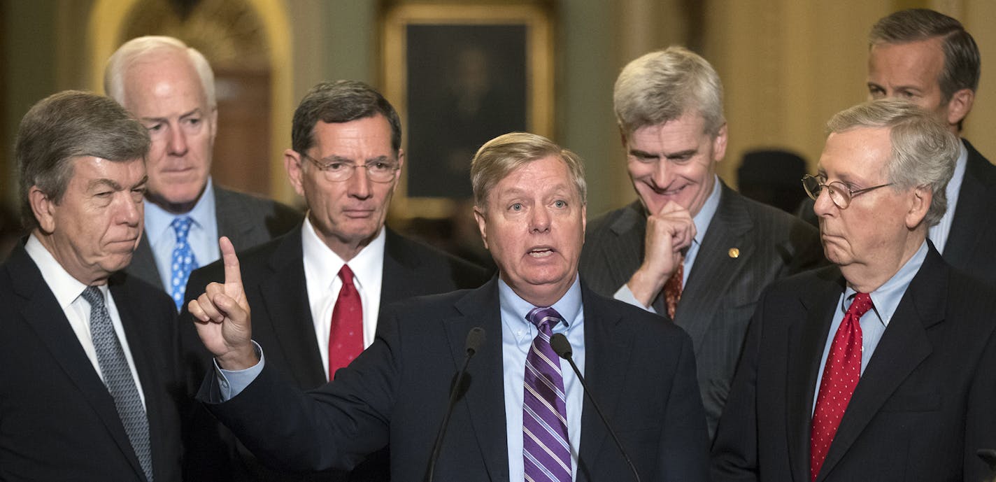 Sen. Lindsey Graham, R-S.C., joined by, from left, Sen. Roy Blunt, R-Mo., Majority Whip John Cornyn, R-Texas, Sen. John Barrasso, R-Wyo., Sen. Bill Cassidy, R-La., Senate Majority Leader Mitch McConnell, R-Ky., and Sen. John Thune, R-S.D., speaks to reporters as he pushes a last-ditch effort to uproot former President Barack Obama's health care law, at the Capitol in Washington, Tuesday, Sept. 19, 2017. To win, 50 of the 52 GOP senators must back it _ a margin they failed to reach when the chamb