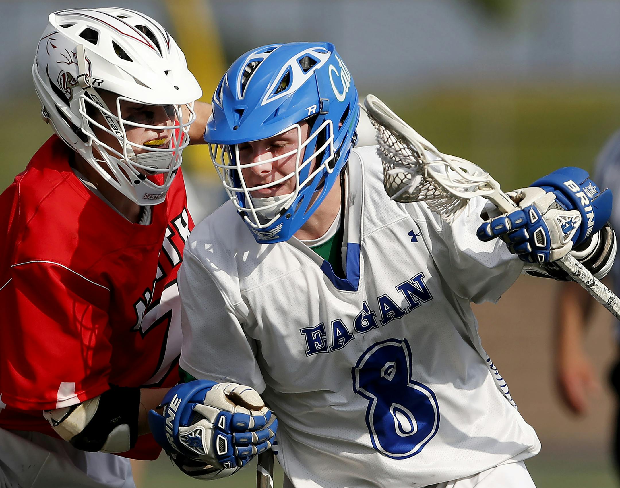 Brandon Wuertz (8) of Eagan was defended by Reed Tisdell (7) of Lakeville North. ] CARLOS GONZALEZ ï cgonzalez@startribune.com - June 13, 2017, Chanhassen, MN, Chanhassen High School, boys lacrosse state quarterfinals, Lakeville North vs. Eagan