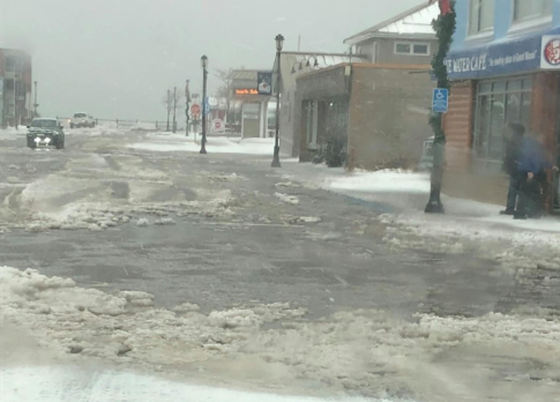 High water and rolling waves sent Lake Superior spilling across downtown Grand Marais during a winter storm Dec. 29.