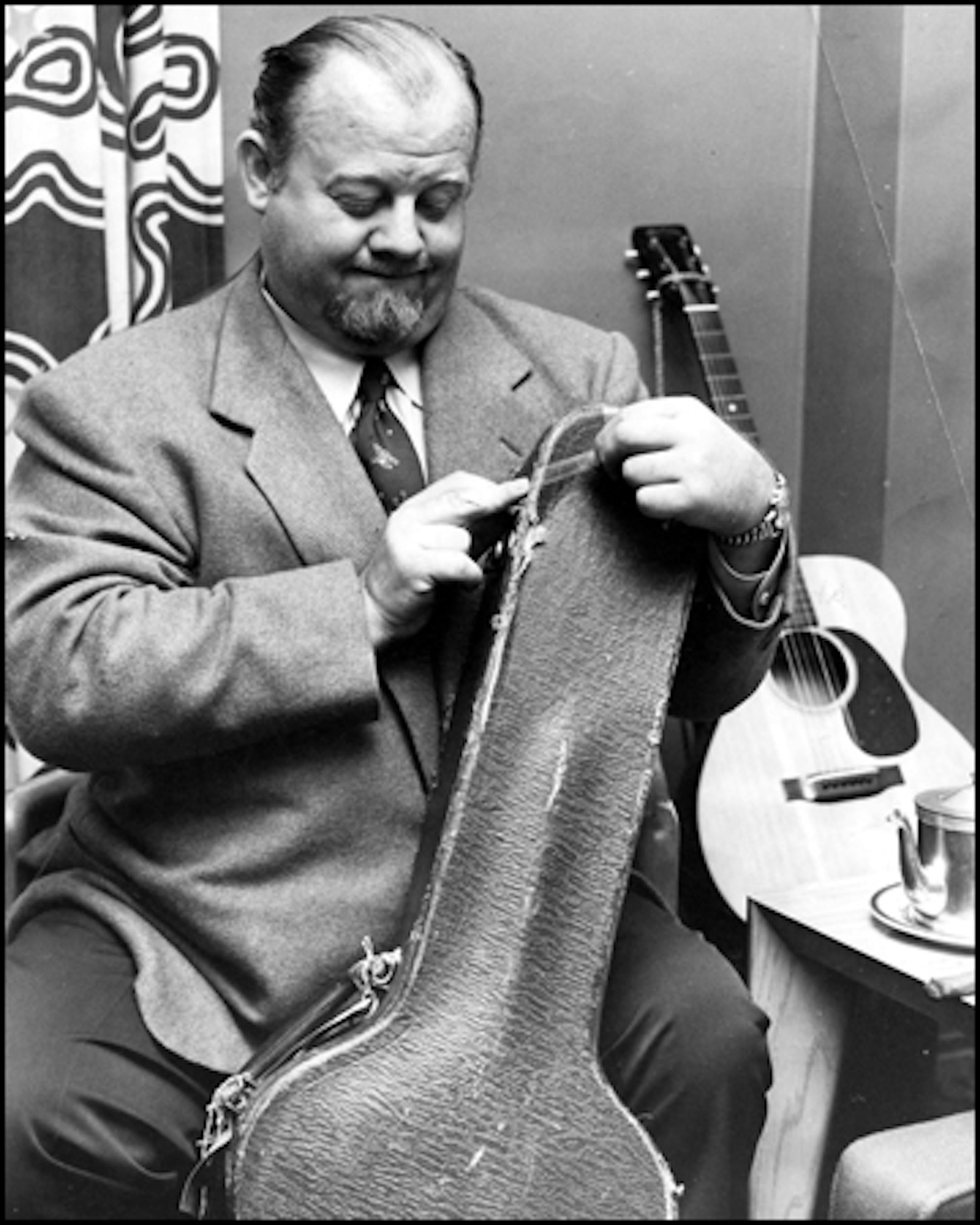 Ives and his guitar case, 1951