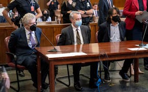 FILE - From left, Glenn Horowitz, Craig Inciardi and Edward Kosinski appear in criminal court after being indicted for conspiracy involving handwritte
