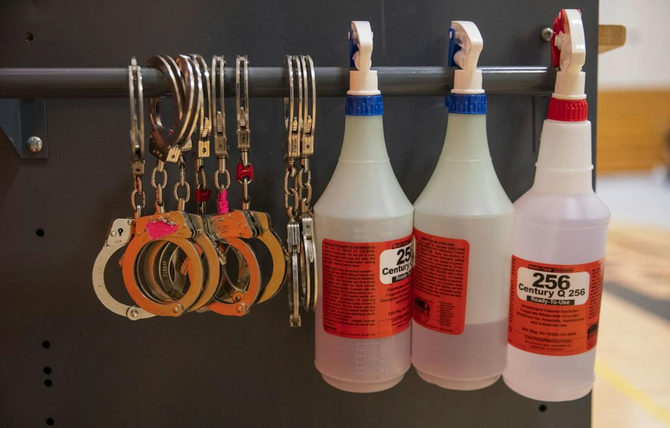 Handcuffs were hung beside bottles of disinfectant spray as law enforcement training took place in the gymnasium at Fond Du Lac Tribal and Community College in Cloquet, Minn. on Tuesday November 17, 2020.