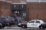 St. Paul Police officers stood out front of The St. Paul Jewish Community Center after it was evacuated after receiving a bomb threat Monday February 