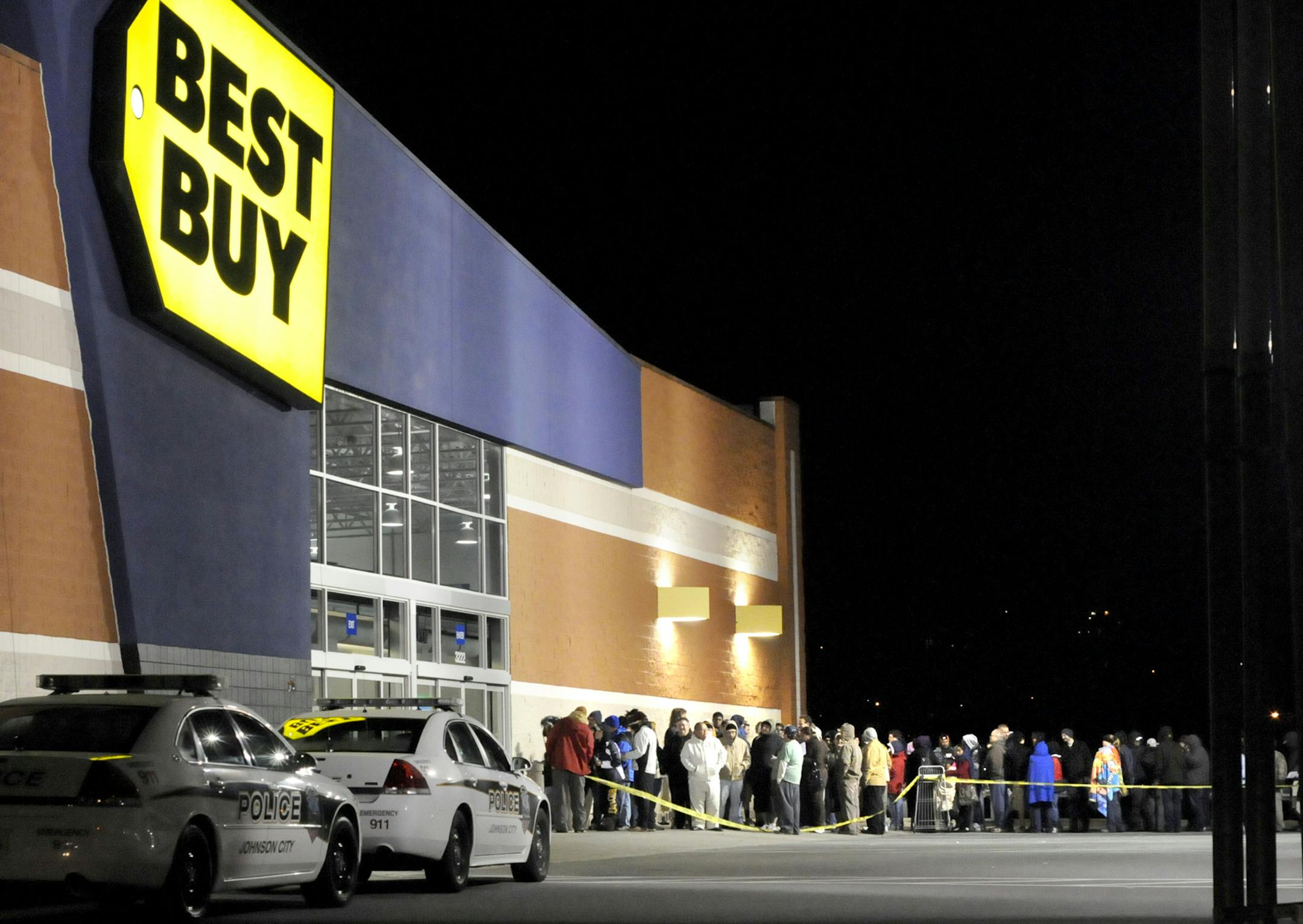 In this Nov. 24, 2011, photo, Black Friday shoppers line up in preparation for sales outside a Best Buy in Johnson City, Tenn. (AP Photo/The Johnson City Press, Lee Talbert) ORG XMIT: MIN2012111312280437