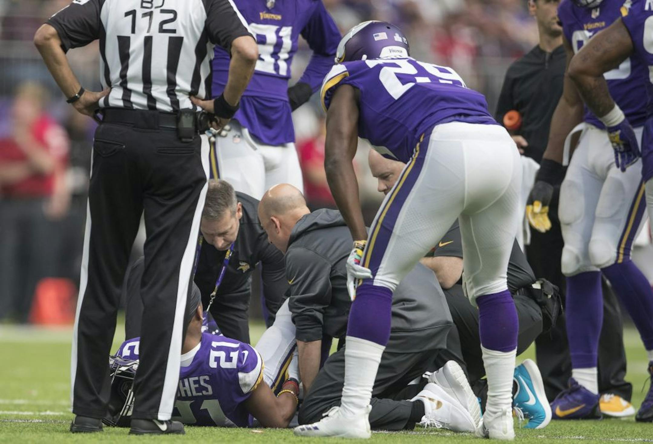 Vikings trainers attended to Minnesota Vikings cornerback Mike Hughes (21) after he was injured in the forth quarter at U.S. Bank Stadium Sunday October 14, 2018 in Minneapolis, MN.