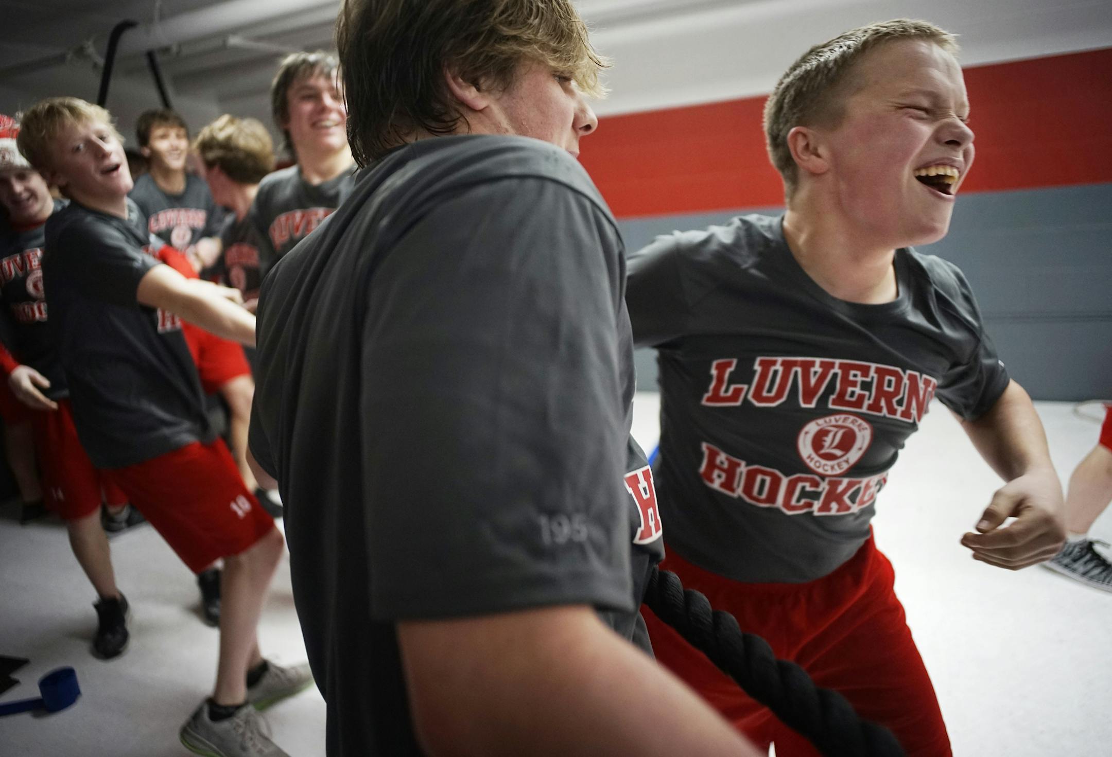 At the Blue Mound Ice Arena, the Luverne hockey team has built a strong following and culture in the region. (F)Brennan Hart and Jesse Kontz play tug-a-war with teammates during dry land training.] rtsong-taatarii@startribune.com/ Richard Tsong-Taatarii