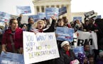 Immigration supporters from CASA de Maryland, an advocacy group, rallied outside the Supreme Court in Washington, Jan. 15, 2016.