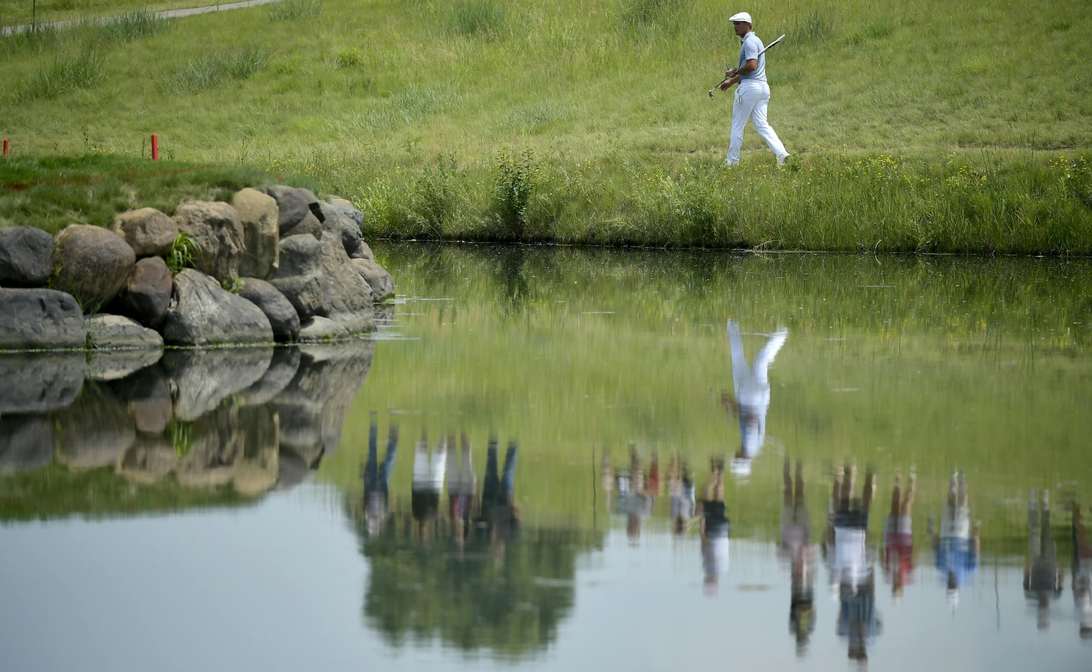 Bryson DeChambeau walked toward the second green during the final day of the 3M Open at TPC Twin Cities.