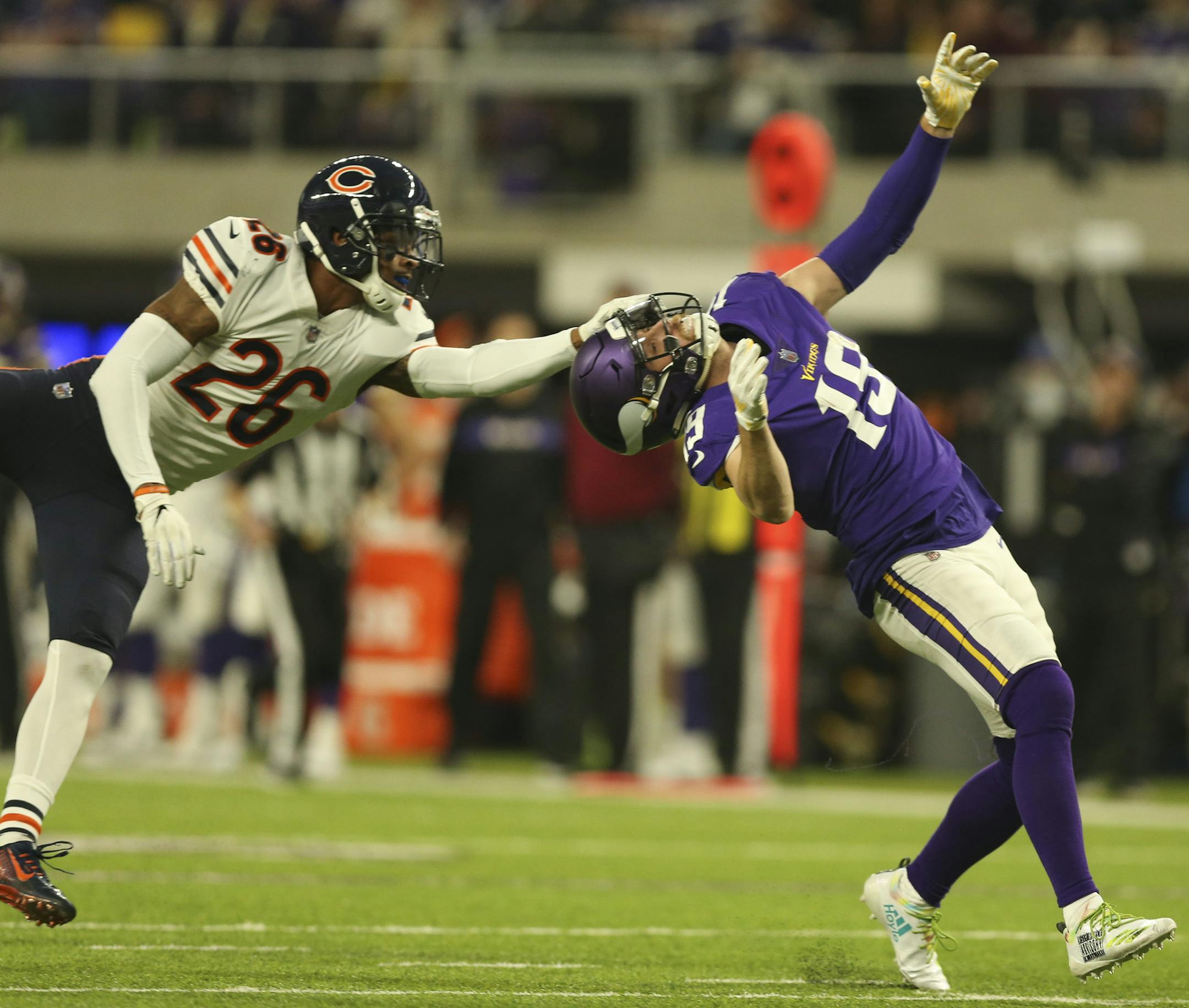 Chicago Bears defensive back Deon Bush (26) was called for a facemask penalty on Minnesota Vikings wide receiver Adam Thielen (19), helping set up a late second quarter field goal. ] JEFF WHEELER • jeff.wheeler@startribune.com The Minnesota Vikings faced the Chicago Bears in an NFL football game Sunday afternoon, December 30, 2018 at U.S. Bank Stadium in Minneapolis.